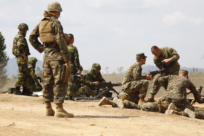 U.S. Marines, Korean and Thai service members work side-by side as they train on the firing range at Ban Chan Khrem, Thailand, Feb. 6 as part of Cobra Gold 2010. The exercise commenced Feb. 1 and is a regularly-scheduled joint/combined exercise in the series of U.S.– Thai military exercises.