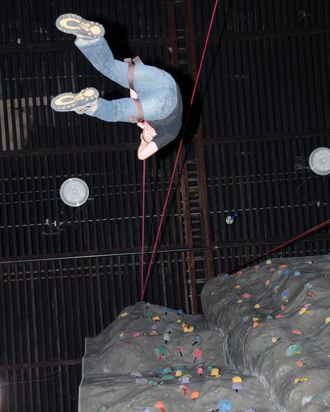 Corgan Davis, son of Nancy Davis, NDI, and Tony Calamanco, Avionics, heads back to the ground after slipping from the wall at the long Lines Rec. Center during Winter Blast.