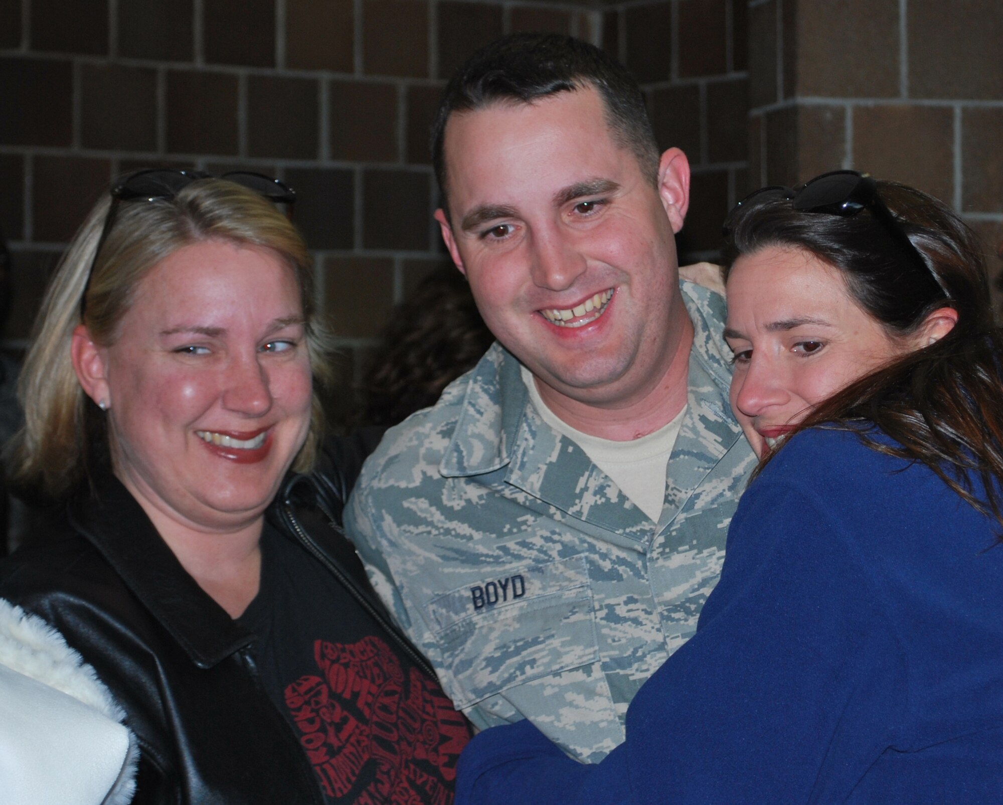 Reservists from the 315th Security Forces Squadron here at Charleston Air Force Base, S.C., returned home from a seven month deployment to Kirkuk Regional Air Base, Iraq, Sunday, Jan. 31. Coworkers, friends and families gathered in the base passenger terminal to welcome the Charleston reservists back home. (Photo by Master Sgt. Cynthia Learn/ Released)