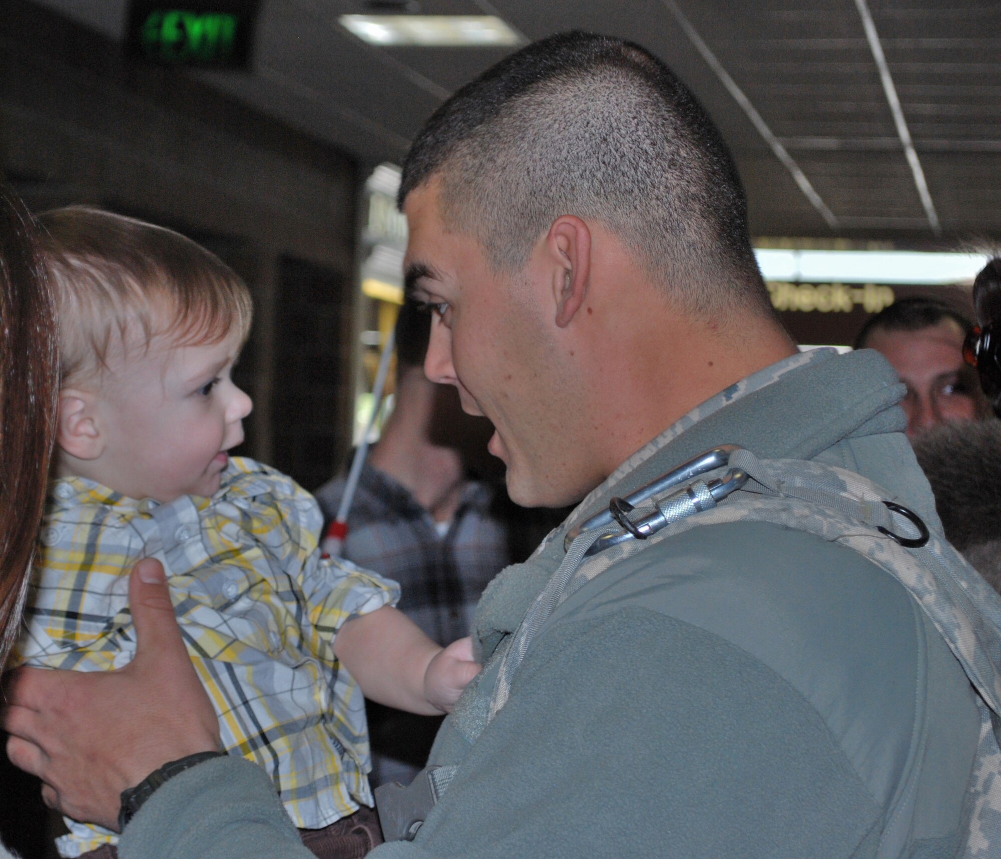 Reservists from the 315th Security Forces Squadron here at Charleston Air Force Base, S.C., returned home from a seven month deployment to Kirkuk Regional Air Base, Iraq, Sunday, Jan. 31. Coworkers, friends and families gathered in the base passenger terminal to welcome the Charleston reservists back home. (Photo by Master Sgt. Cynthia Learn/ Released)