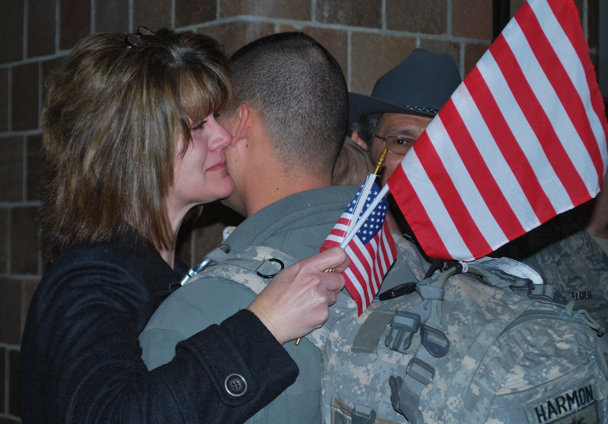 Reservists from the 315th Security Forces Squadron here at Charleston Air Force Base, S.C., returned home from a seven month deployment to Kirkuk Regional Air Base, Iraq, Sunday, Jan. 31. Coworkers, friends and families gathered in the base passenger terminal to welcome the Charleston reservists back home. (Photo by Master Sgt. Cynthia Learn/ Released)