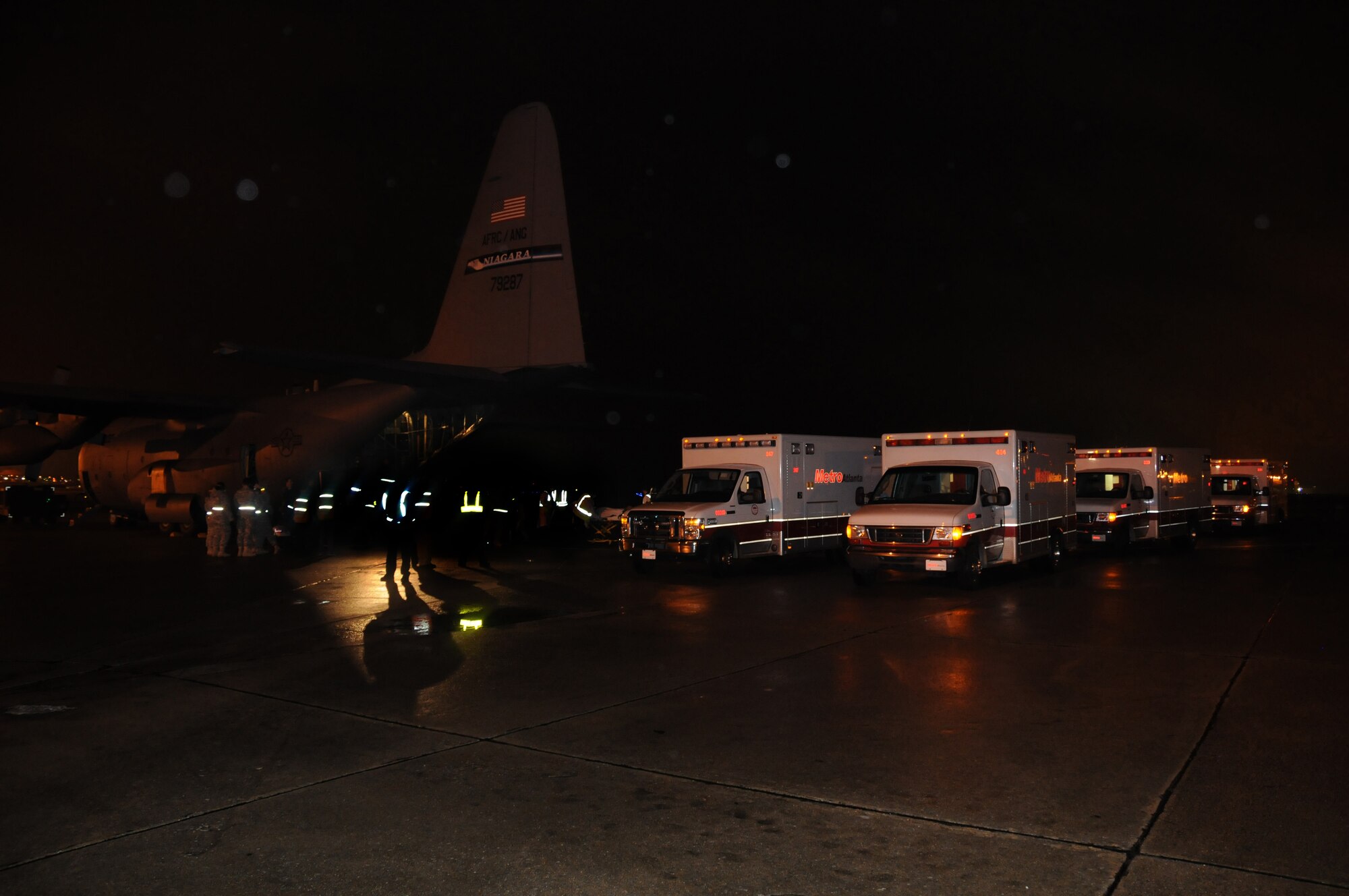 The C-130 from Haiti carrying medical evacuees was greeted by an entourage of medical personnel to take the patients onward to civilian hospitals for further treatment.  The 107th responded in support of Operation Unified Relief just four days after the 7.0 earth quake ravished Port-au-Prince, Haiti. (U.S. Air Force photo/Staff Sgt. Peter Dean) 
