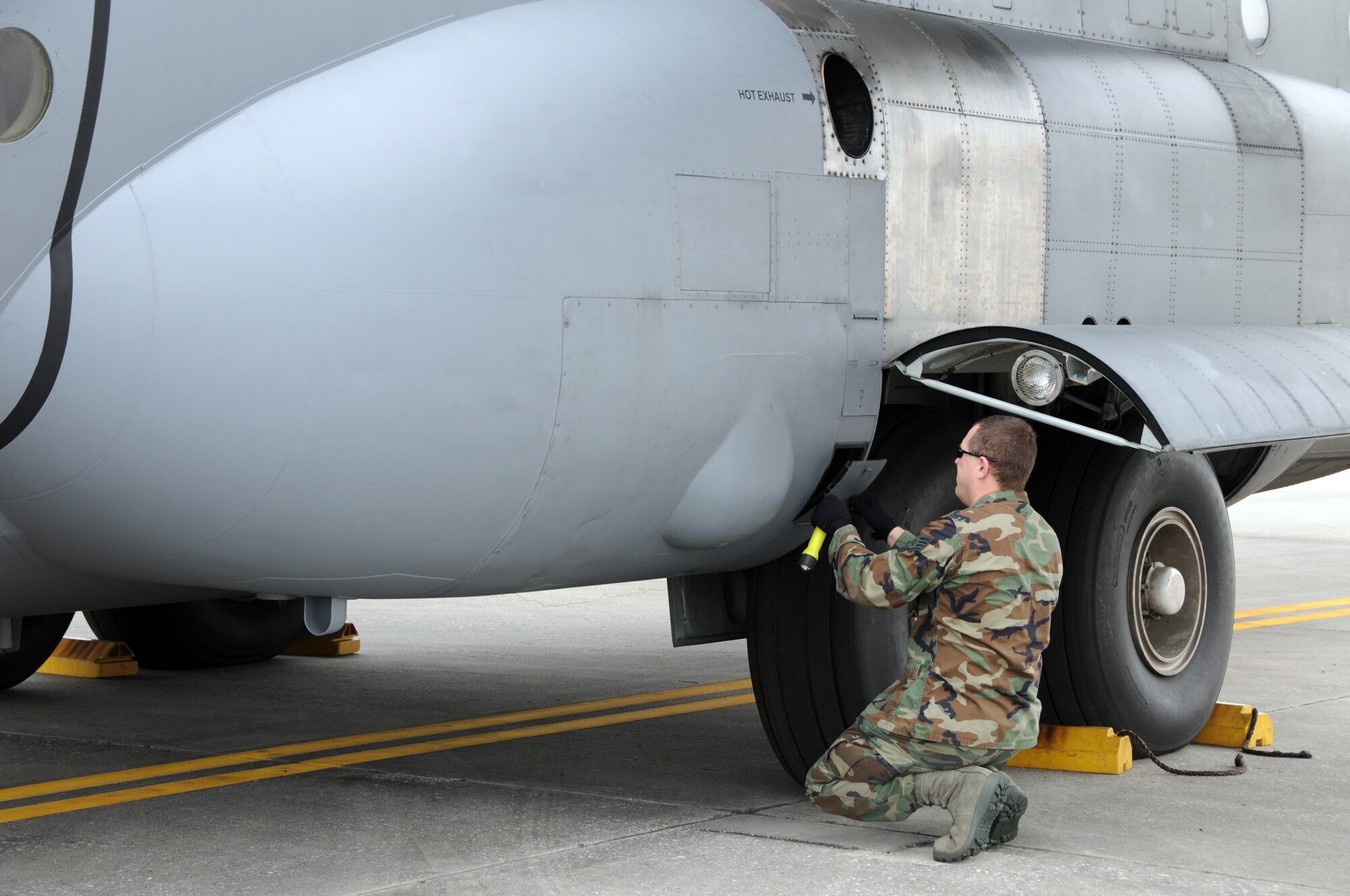 107th AW crew chief Staff Sgt. Joe Hodkin readies a C-130 for flight. The sergeant volunteered along with other aircrew in support of Operation Unified Relief. (U.S. Air Force photo/Staff Sgt. Peter Dean)  