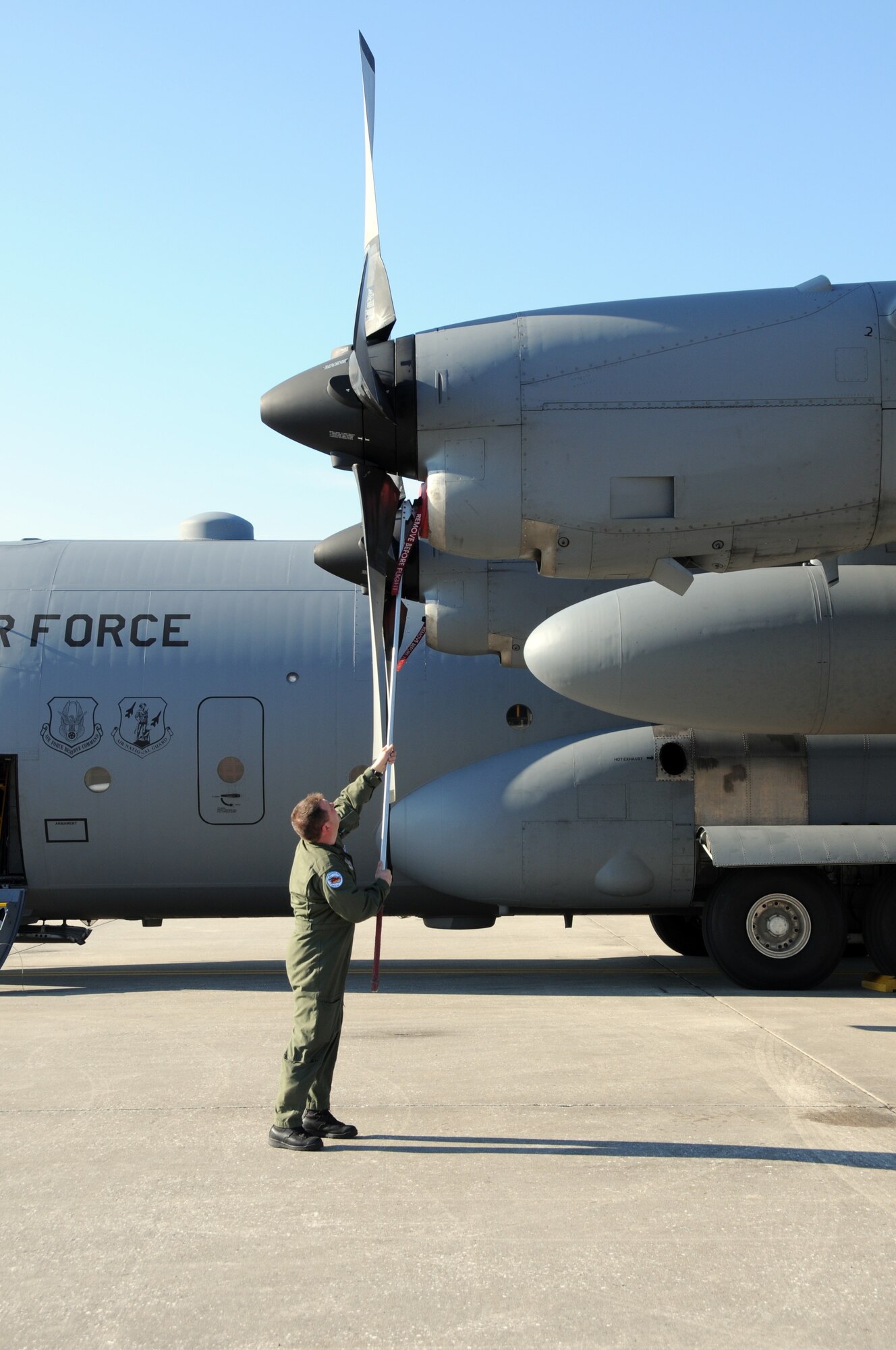 107th AW load master Senior Master Sgt. Thomas Obrochta readies a C-130 for flight. The sergeant volunteered along with other aircrew in support of Operation Unified Relief. (U.S. Air Force photo/staff Sgt. Peter Dean)  
