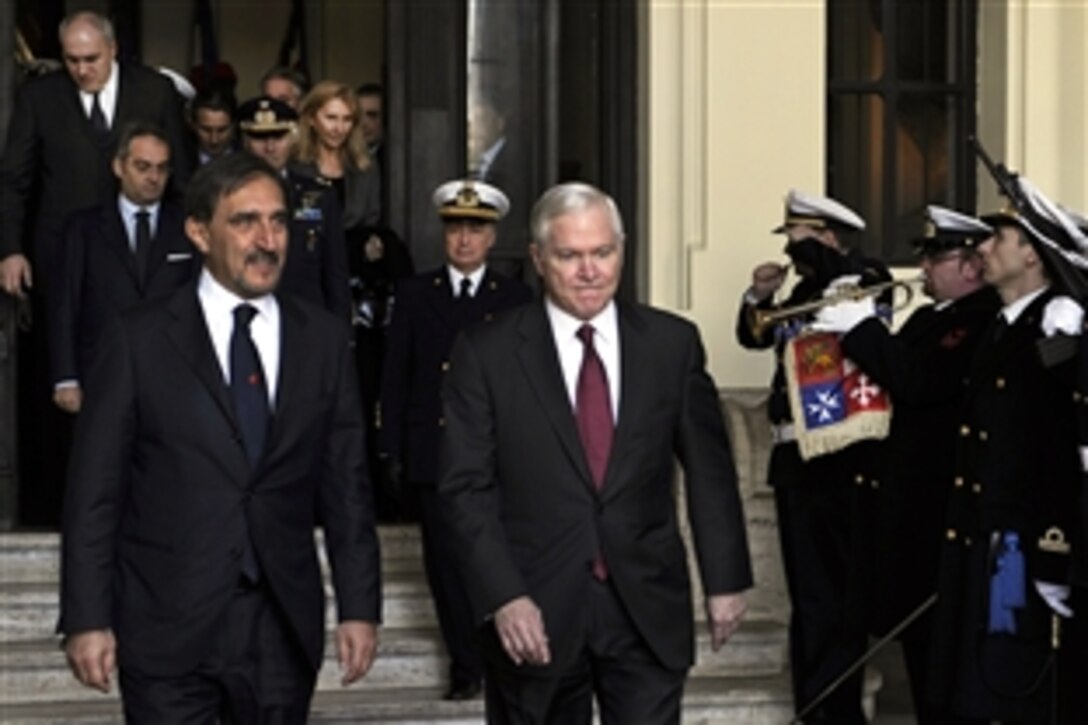 U.S. Defense Secretary Robert M. Gates and Italian Defense Minister Ignazio La Russa  depart Palazzo Marina after their meeting in Rome, Feb. 7, 2010.  