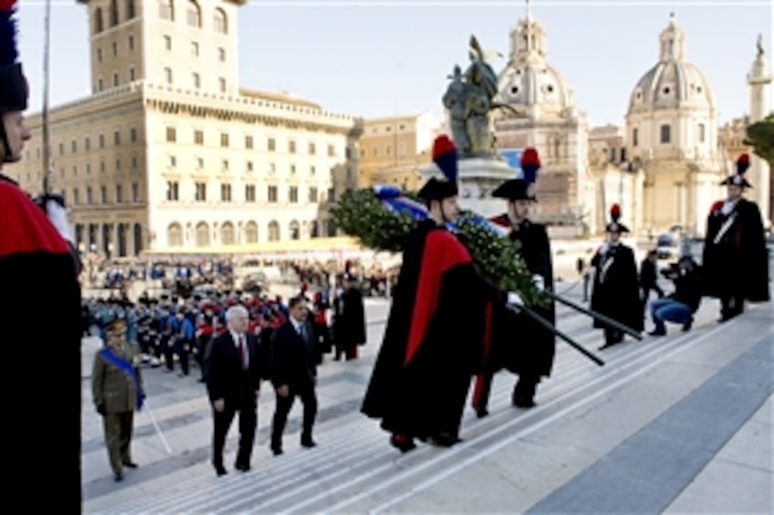 U.S. Defense Secretary Robert M. Gates and Italian Defense Minister Ignazio La Russa prepare to lay a wreath at the Italian Tomb of the Unknown Solider at the Vittorio Emanuale Monument in Rome, Feb. 7, 2010.