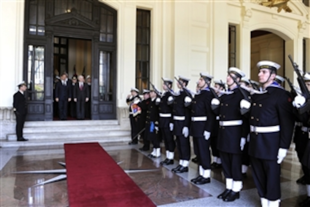 U.S. Defense Secretary Robert M. Gates and Italian Defense Minister Ignazio La Russa  depart Palazzo Marina after their meeting in Rome, Feb. 7, 2010.