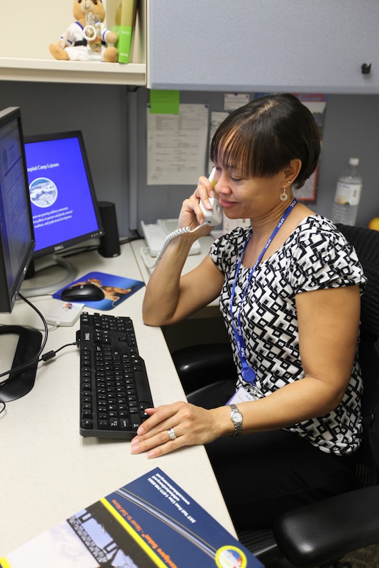 MARINE CORPS BASE CAMP LEJEUNE, N.C. - Jeanette Bradway, recovery care coordinator at Naval Hospital Camp Lejeune, speaks with a sailor over the phone about The Navy Safe Harbor Program. The program, which began in 2005, works to help injured sailors and Coast Guardsmen solve the problems they face stemming from their injuries.