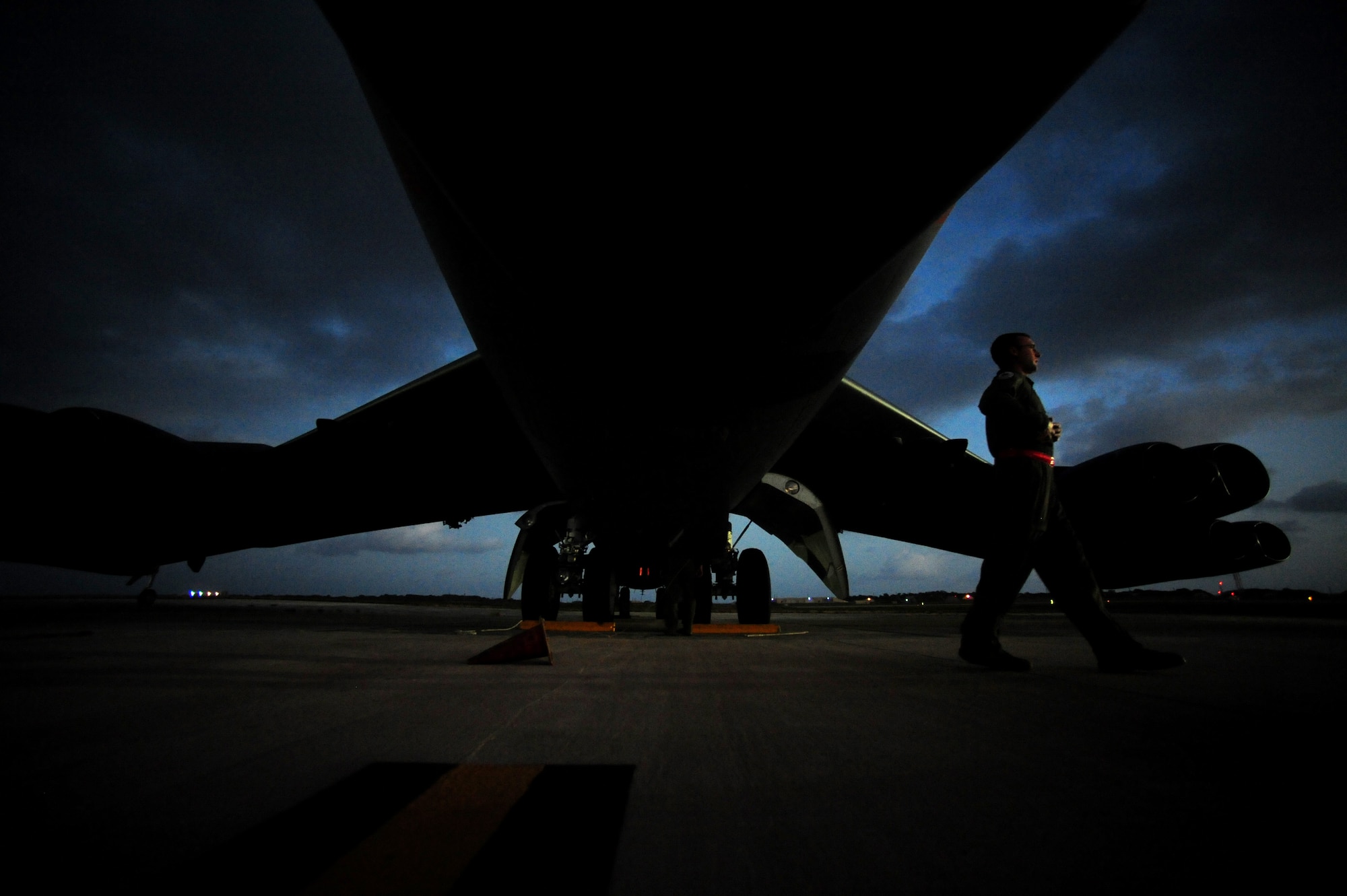 U.S. Air Force Capt. Jacob Wilwert, a B-52 Stratofortress pilot assigned to the 20th Expeditionary Bomb Squadron, Barksdale Air Force Base, La., conducts preflight checks on a B-52 aircraft prior to a mission in support of Exercise Cope North at Andersen AFB, Guam, Feb. 9, 2010. The United States Air Force and the Japanese Air Self-Defense Force conduct Cope North annually to increase combat readiness and interoperability, concentrating on coordination and evaluation of air tactics, techniques and procedures.  The ability for both nations to work together increases their preparedness to support real-world contingencies.  (U.S. Air Force photo by Staff Sgt. Jacob N. Bailey)