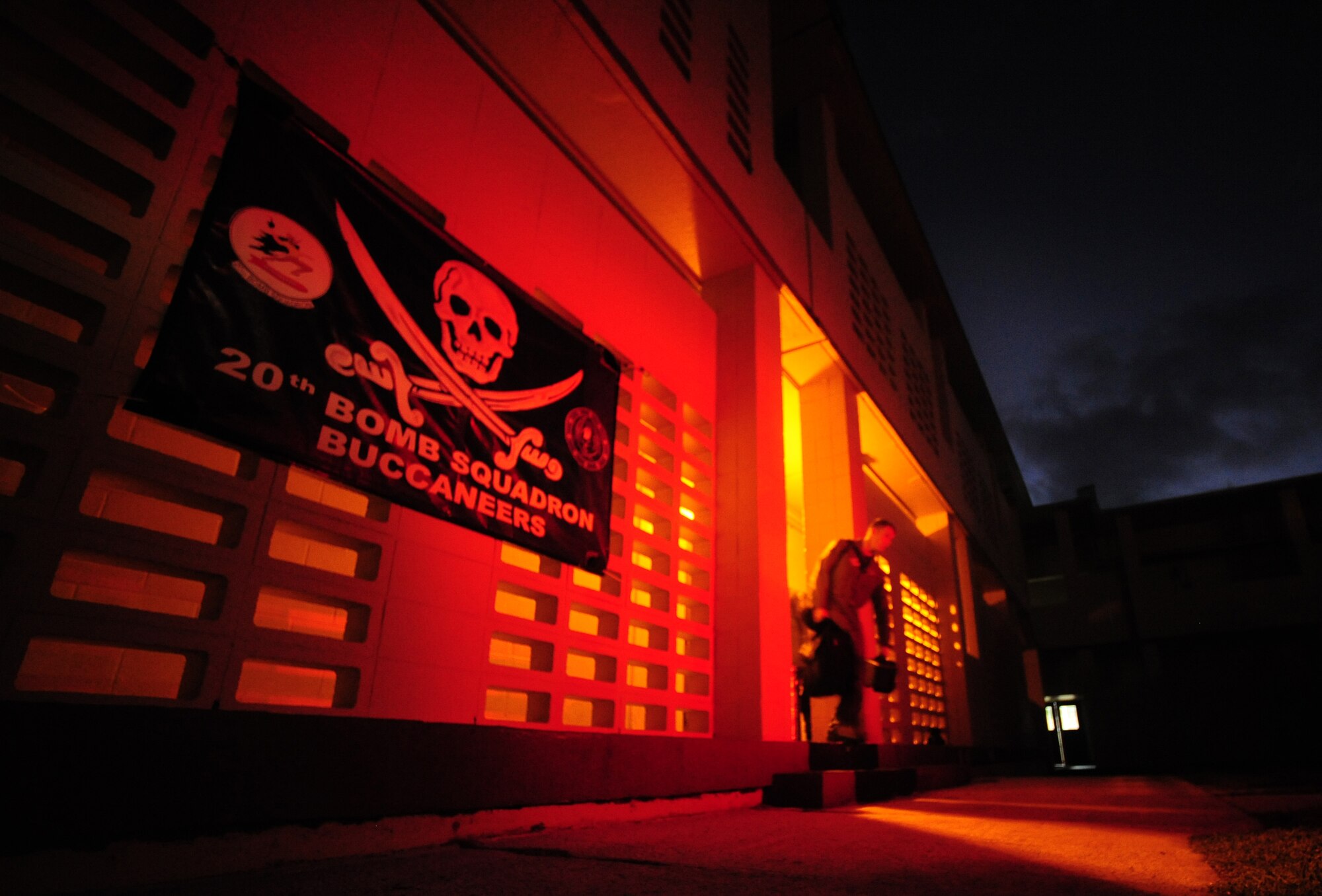 A U.S. Air Force aircrew member from the 20th Expeditionary Bomb Squadron steps from a crew brief prior to a mission in support of Exercise Cope North at Anderson Air Force Base, Guam, Feb. 9, 2010. The 20th EBS is deployed from Barksdale AFB, La. The United States Air Force and the Japanese Air Self-Defense Force conduct Cope North annually to increase combat readiness and interoperability, concentrating on coordination and evaluation of air tactics, techniques and procedures. The ability for both nations to work together increases their preparedness to support real-world contingencies.  (U.S. Air Force photo by Staff Sgt. Jacob N. Bailey)