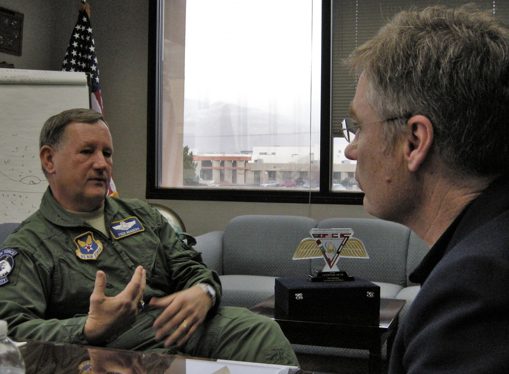 Maj. Gen.  Fred Roggero, Air Force chief of safety and commander, Air Force Safety Center, discusses the center's mission with Robert Goyer, FLYING Magazine senior editor. U.S. Air Force photo by Marie Vanover
