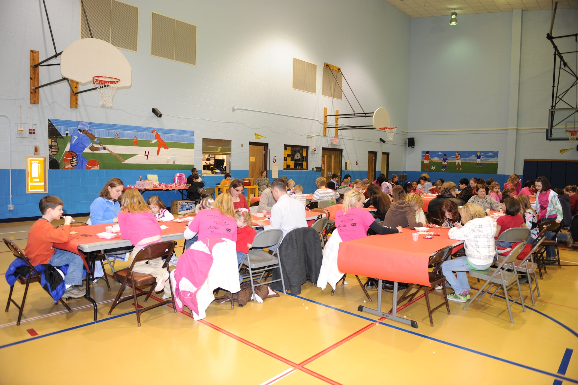 Ellsworth family members of Airmen either deployed or on remote assignments play bingo during Sweetheart Bingo on Feb 5. The Airman and Family Readiness Center sponsored this event. The mission of the Ellsworth AFRC is to have  professionals provide versatile and responsive foundations which build readiness, retention and resiliency and lead to personal effectiveness.  (U.S. Air Force photo/Master Sgt Loren J. Bonser)
