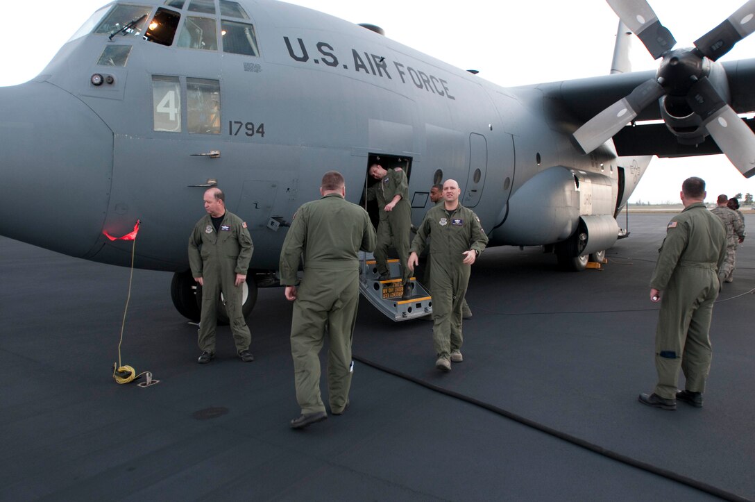 139th Airlift Wing, Mo. Air National Guard, aircrew members prepare their C-130 for departure from Homestead Air National Guard base, Florida, for relief efforts in Haiti on February 6th, 2010. (U.S. Air Force photo by Master Sgt. Shannon Bond/Released)