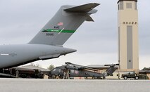MOODY AIR FORCE BASE, Ga. -- An HH-60G Pave Hawk is loaded onto a C-17 Globemaster III from McChord Air Force Base, Wash., here Feb. 2. The C-17 will be transporting the aircraft and Airmen to Afghanistan where they will provide humanitarian support. (U.S. Air Force photo by Airman 1st Class Joshua Green)