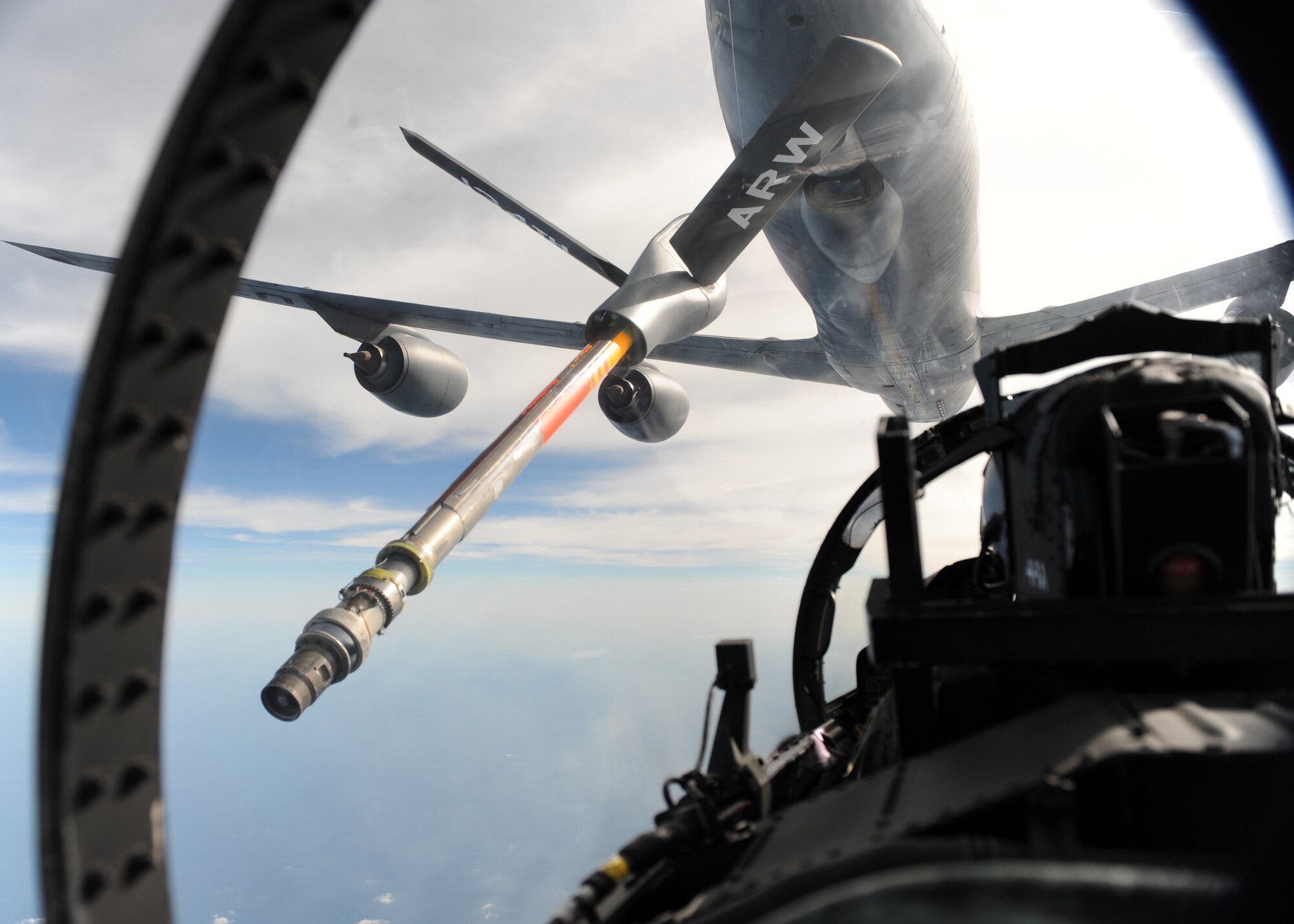 An F-15E Strike Eagle connects with a KC-135 Stratotanker from the 134th Air Reserve Wing for a refuel during a Combat Hammer mission Feb. 3.  Combat Hammer is an Air-to-Ground Weapons System Evaluation Program controlled by the 86th Fighter Weapons Squadron.  The F-15s from Seymour Johnson AFB, N.C., participated in the week-long evaluation dropping GPS and laser-guided weapons.  The WSEP was the first evaluation of Small Diameter Bombs at Eglin and first evaluation of Laser Joint Direct Attack Munitions in a Combat Hammer.  The WSEP program, run by the 53d Weapons Evaluation Group, is used to evaluate the effectiveness and suitability of combat air force weapon systems. The evaluations are accomplished during tactical deliveries of fighter, bomber and unmanned aerial system precision guided munitions, on realistic targets with air-to-air and surface-to-air defenses. For many of the aircrew participating in WSEP, it is the first time employing live weapons. This provides a level of combat experience many units face during combat.  (U.S. Air Force photo/Maj. Scott Alford.)