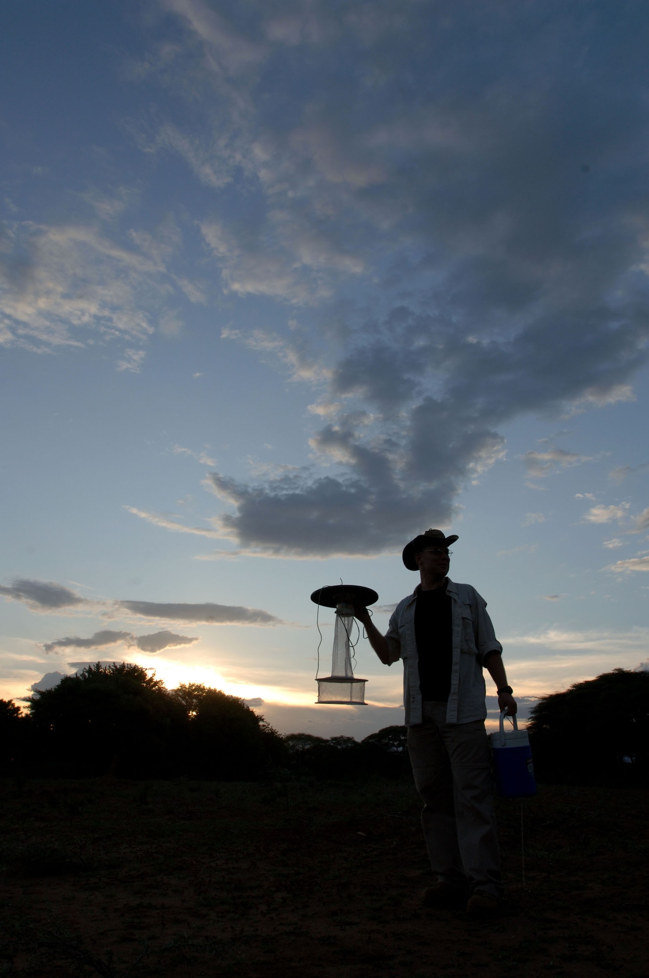 Maj. Keith Blount takes traps out into a field to capture sand flies, which carry leishmaniasis, during the vector-borne and infectious disease field diagnostic development initiative Jan. 8, 2010, in Marigat, Kenya. Major Blount is an entomologist. (U.S. Air Force photo/Senior Airman Josie Kemp)
