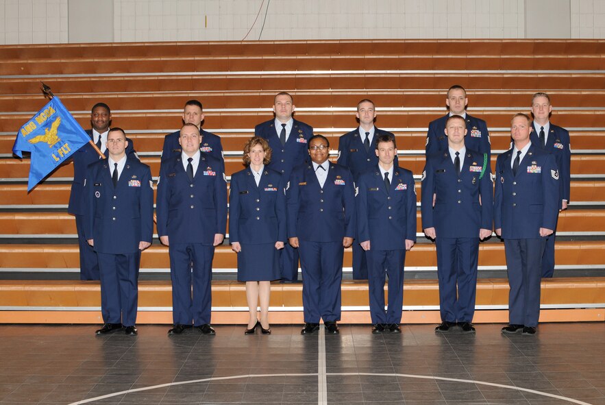 McGHEE TYSON AIR NATIONAL GUARD BASE, Tenn. -- NCO Academy Class 10-3, L-Flight, gathers at The I.G. Brown Air National Guard Training and Education Center here, Jan. 25, 2010.  Pictured (L-R front row) are Tech. Sgt. Michael S. Phillips; Tech. Sgt. Matthew B. Willars; Tech. Sgt. Cheryl A. Gage; Tech. Sgt. Shari l. Stewart; Tech. Sgt. Michael D. Dorsey, Jr.; Tech. Sgt. Chad A. Ryan; Tech. Sgt. Charles A. Hoover, NCOA instructor; (L-R back row) Tech. Sgt. Nate J. Robinson Sr.; Tech. Sgt. Joseph S. Bosacco; Tech. Sgt. Richard J. Campbell; Tech. Sgt. Micah T. Collins; Tech. Sgt. Jason W. Wilson; and Tech. Sgt. Jason J. Ley. (U.S. Air Force photo by Master Sgt. Kurt Skoglund/Released)