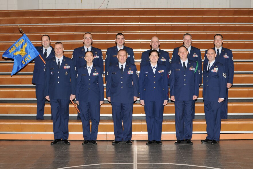 McGHEE TYSON AIR NATIONAL GUARD BASE, Tenn. -- NCO Academy Class 10-3, C-Flight, gathers at The I.G. Brown Air National Guard Training and Education Center here, Jan. 25, 2010.  Pictured (L-R front row) are Tech. Sgt. Matthew A. Reichle; Tech. Sgt. Adrianne L. Wilson; Tech. Sgt. Timothy A. Turnbaugh; Petty Officer 1st Class Barbara T. Wikel; Tech. Sgt. Donn E. Sturtevant; Tech. Sgt. Jeffrey D. Glawe, NCOA instructor; (L-R back row) Tech. Sgt. Daniel E. Hallman; Tech. Sgt. Jan K. Ahner; Tech. Sgt. Michael R. Nakoski; Tech. Sgt. Blake A. Pumphrey; Tech. Sgt. Ronald J. Jones; and Tech. Sgt. Derek A. Streissguth. (U.S. Air Force photo by Master Sgt. Kurt Skoglund/Released) 