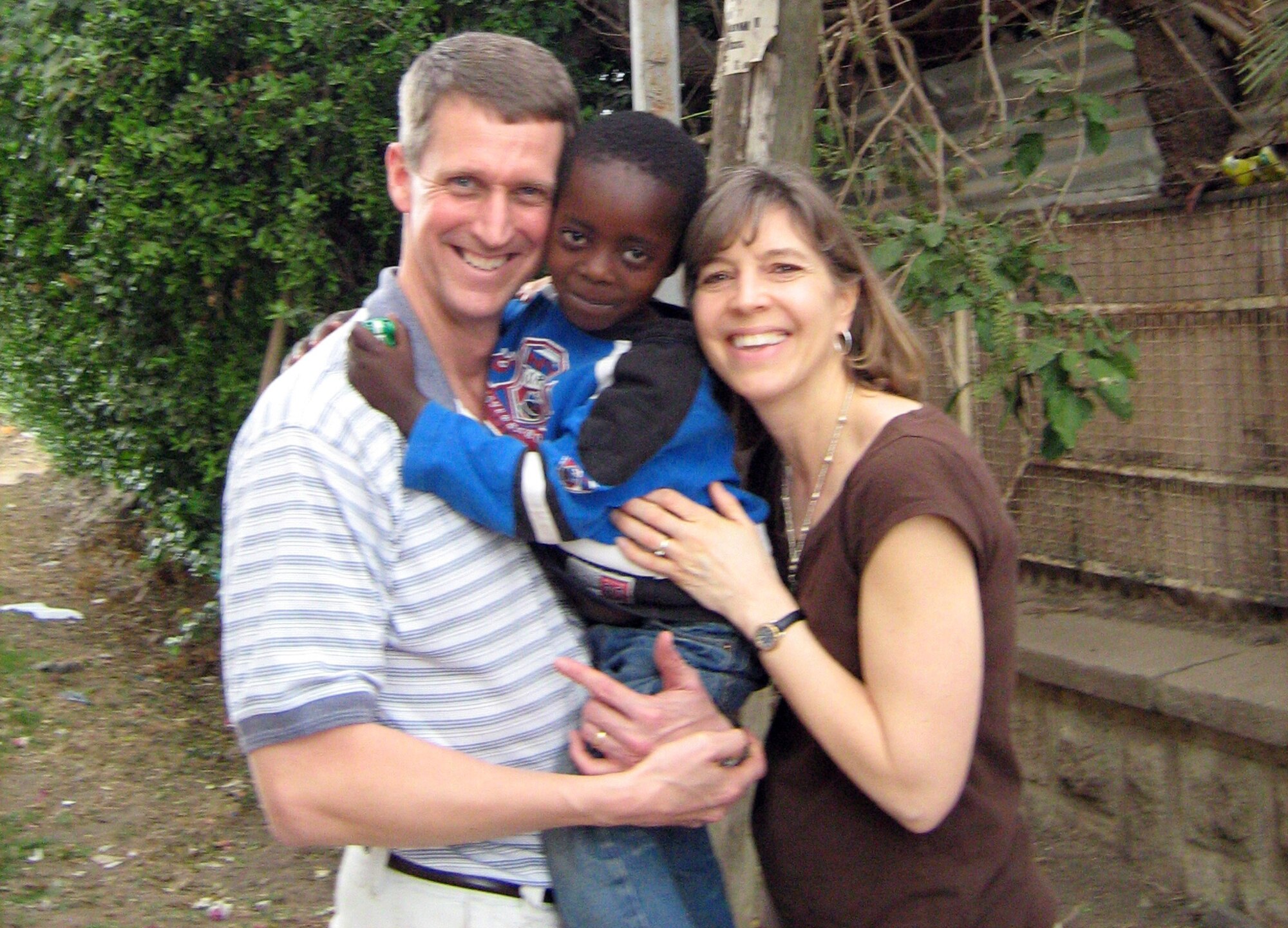 Col. John Marselus and his wife, Kim, pose for a photo with their adopted 5-year-old son, Caleb, Feb. 1, 2010, at Osan Air Base, South Korea. The Marselus' adopted Caleb from Ethiopia in January 2010. Colonel Marselus is the 607th Air and Space Operations Center commander. (Courtesy photo)