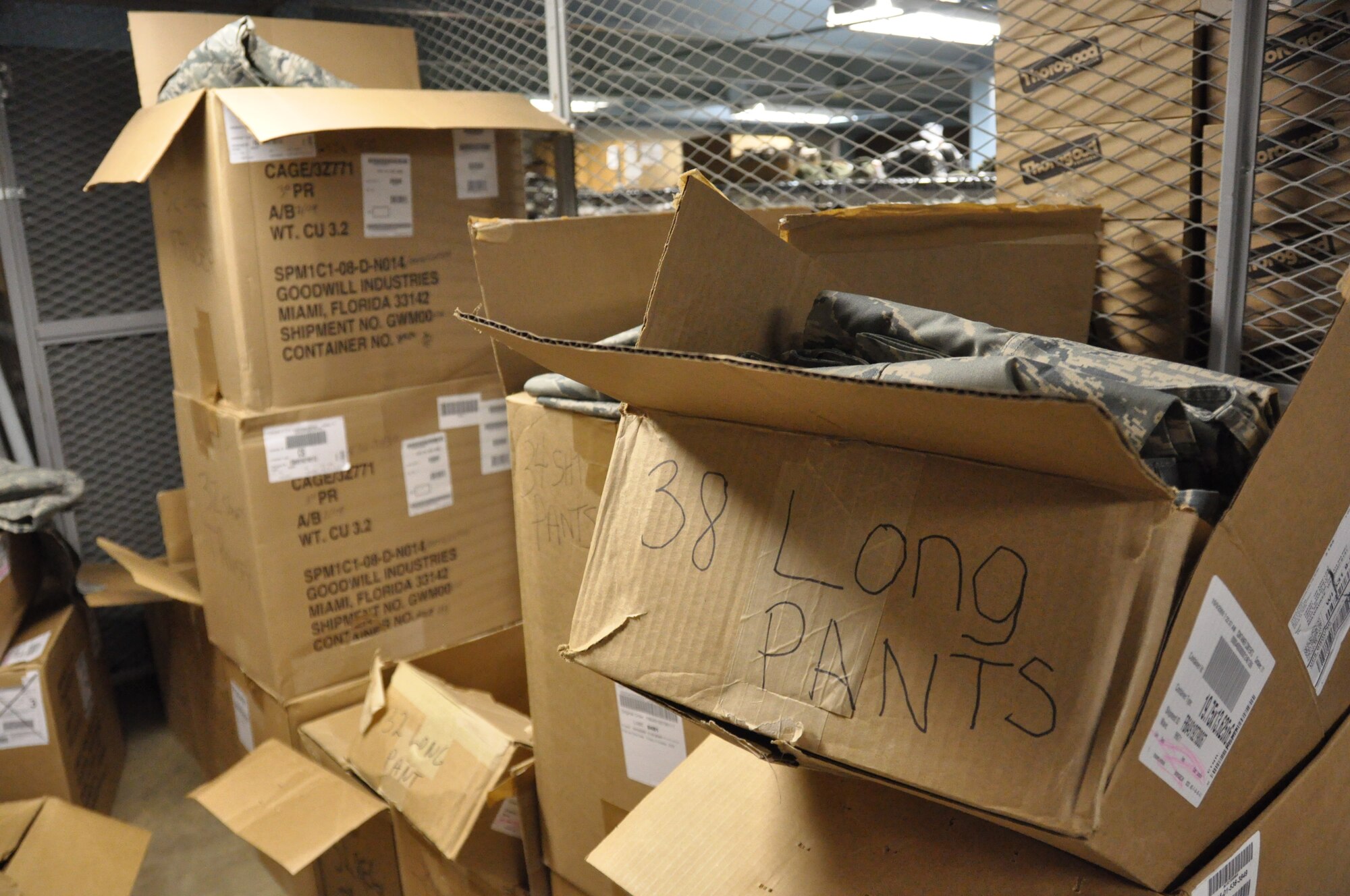 Boxes of ABU pants, 38 Long, crowd the entrance of Retail Sales in the supply warehouse at the 128th Air Refueling Wing.  (US Air Force Photo by: SSgt Nathan Wallin)