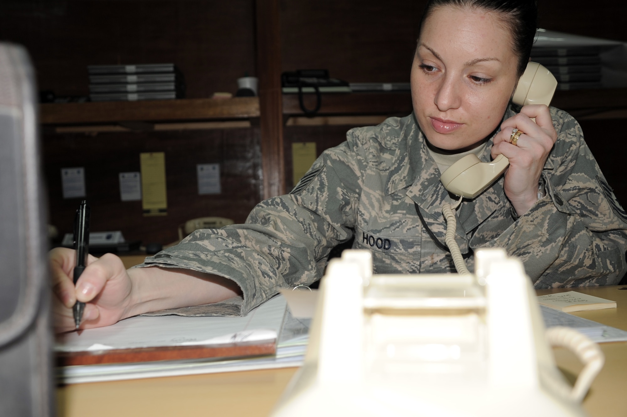 Tech. Sgt. Wendy Hood, command post craftsman deployed with the 380th Air Expeditionary Wing Command Post, works in her office during operations at a non-disclosed base in Southwest Asia on Feb. 3, 2010. Sergeant Hood is on her sixth deployment, but her first as a command post Airman.  She deployed previously as a civil engineering structures craftsman.  Sergeant Hood is deployed from the 75th Air Base Wing Command Post at Hill Air Force Base, Utah, and her hometown is Hooksett, N.H.  (U.S. Air Force Photo/Master Sgt. Scott T. Sturkol/Released)