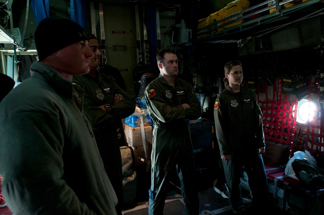 139th Airlift Wing, Saint Joseph Missouri, Air National Guard, C-130 crew members get a pre-departure briefing before departing to assist with the Haiti relief efforts on February 3, 2010. (U.S Air Force photo by Master Sgt. Shannon Bond/Released)