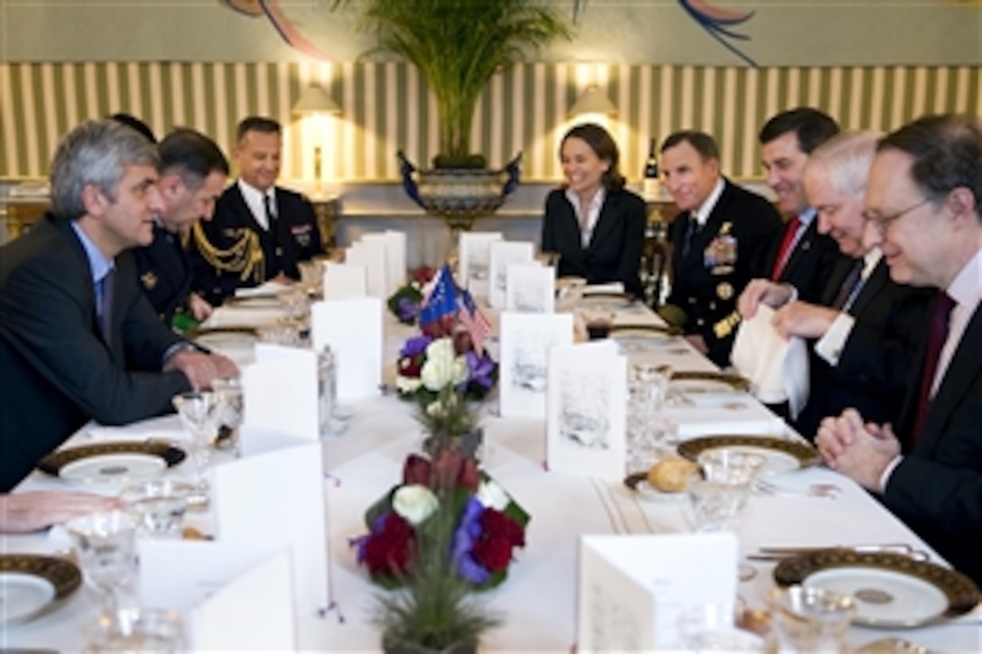 U.S. Defense Secretary Robert M. Gates meets with French Defense Minister Herve Morin in Paris, Feb. 8, 2010.