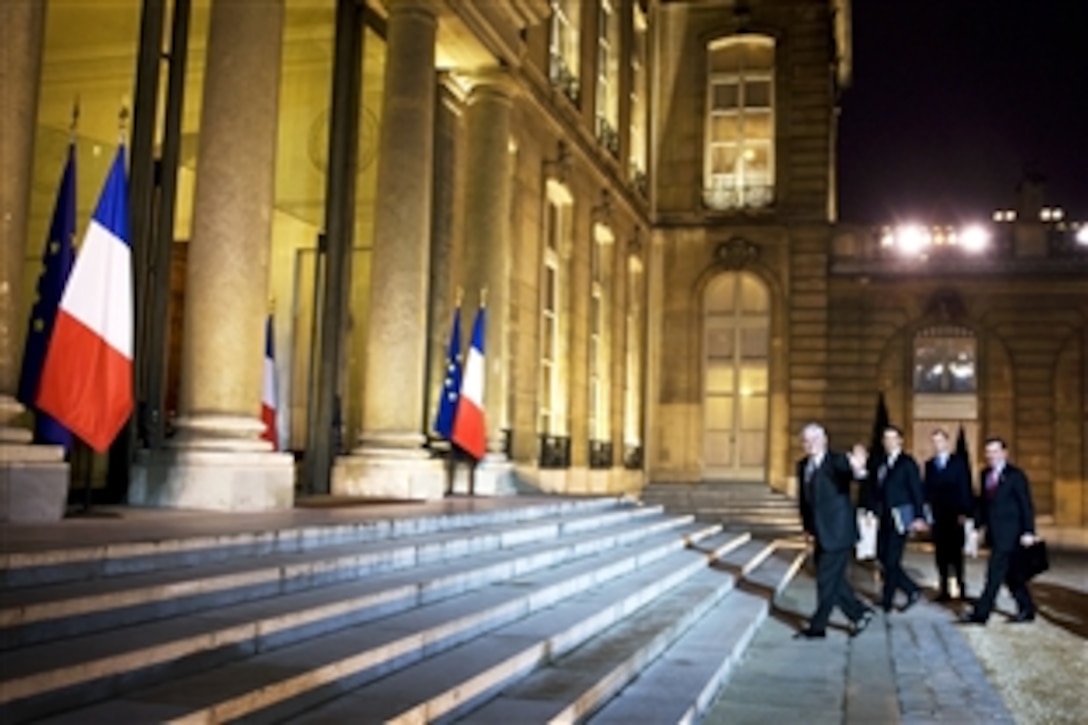 U.S. Defense Secretary Robert M. Gates walks up the steps of Palais de l'Elysee to meet with French President Nicolas Sarkozy in Paris, Feb. 8, 2010.