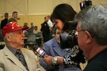 Irving Schlossenberg is interviewed by a Kansas City television station during the 2009 Lenexa Police Department Marine Corps birthday celebration. Schlossenberg was the oldest living Marine combat correspondent at the time. He died of congestive heart failure Sunday. Schlossenberg served in World War II from 1942 to 1945 during which he served in five pacific campaigns including four first wave landings.