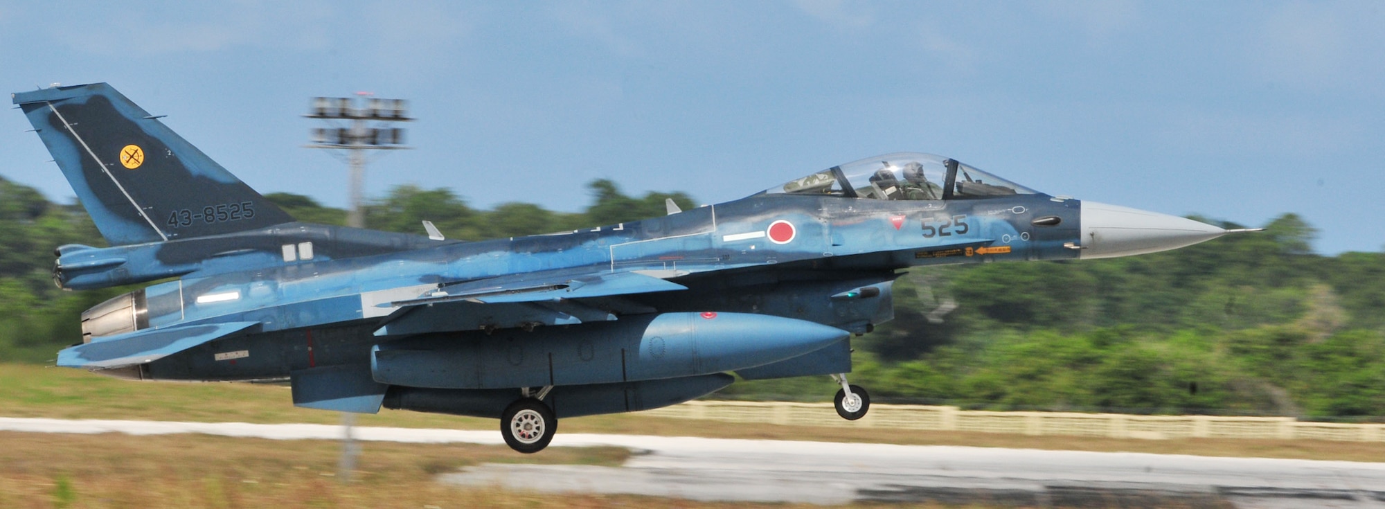 A Japan Air Self Defense Force F-2 fighter lands in order to participate in the two-week Cope North exercise Feb. 5, 2010, at Andersen Air Force Base, Guam. The Japanese F-2 single-engine fighter has performance capabilities roughly comparable to those of the F-16 Fighting Falcon. (U.S. Air Force photo/Airman 1st Class Julian North)
