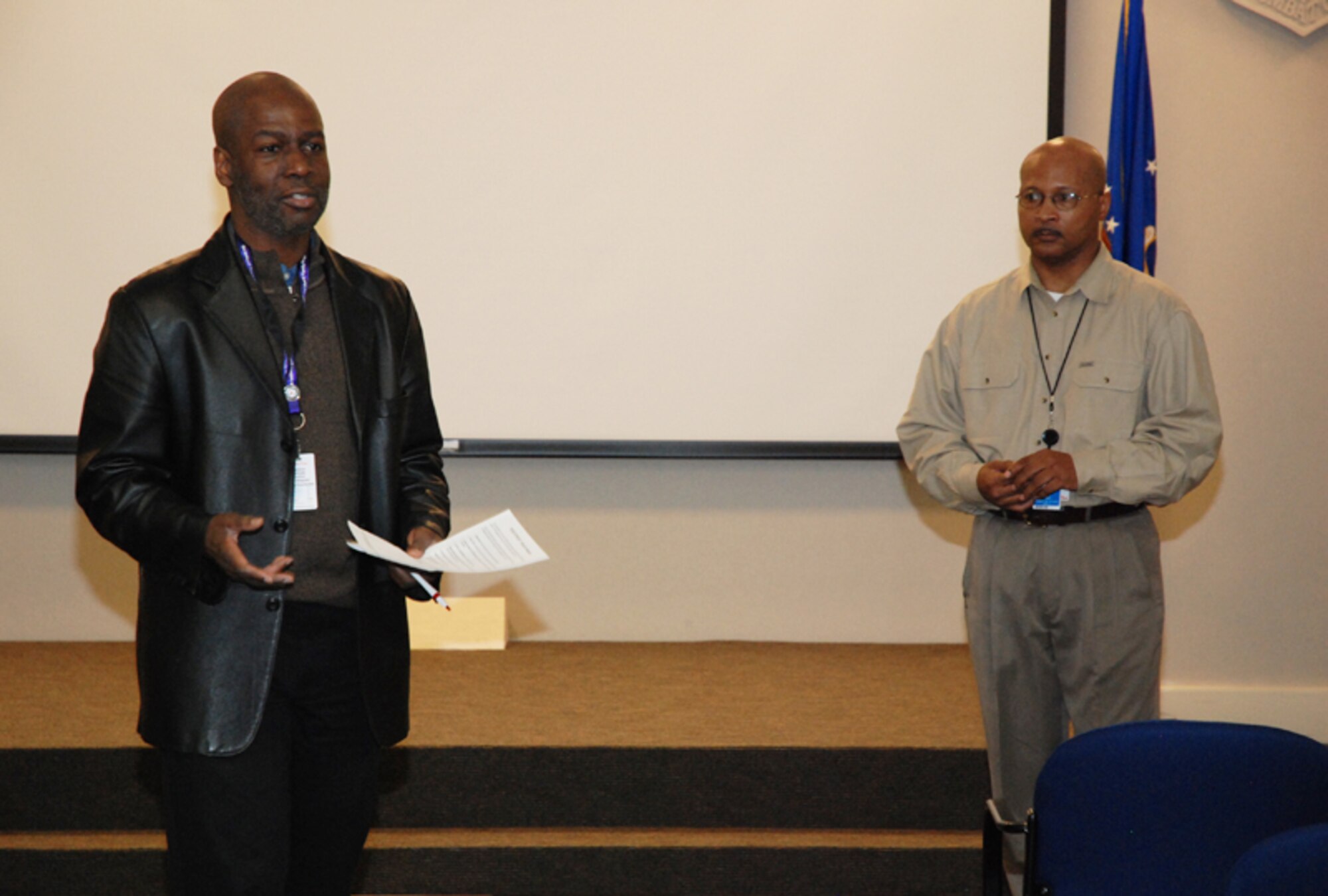 Dr. Curtis Lucas and Dennis Cox from the Marietta Vet Center Readjustment Counseling Service (MFLC) discuss the center’s outreach and readjustment services with Airmen at the health information at the Yellow Ribbon Reintegration Program at the 22nd Air Force Conference Center here Feb. 7. The goal of the program is to prepare them for mobilization, sustain them during mobilization, and reintegrate Airmen with their families, communities, and employers upon return. (U.S. Air Force photo/Senior Airman Shaun Shenk)