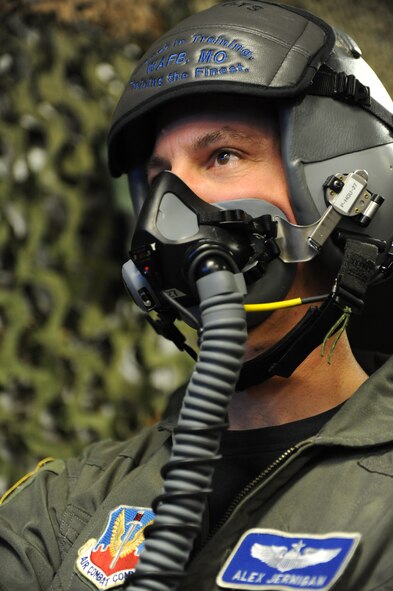 WHITEMAN AIR FORCE BASE, Mo. - Maj. Alex Jernigan, Detachment 12 commander, is supplied oxygen during hypoxia recognition training, Feb. 8, 2010. The training is used as a refresher course in recognizing individual signs of hypoxia, a deficiency of oxygen to the body that is sufficient enough to cause an impairment of function. (U.S. Air Force photo/Airman 1st Class Carlin Leslie)(Released)






