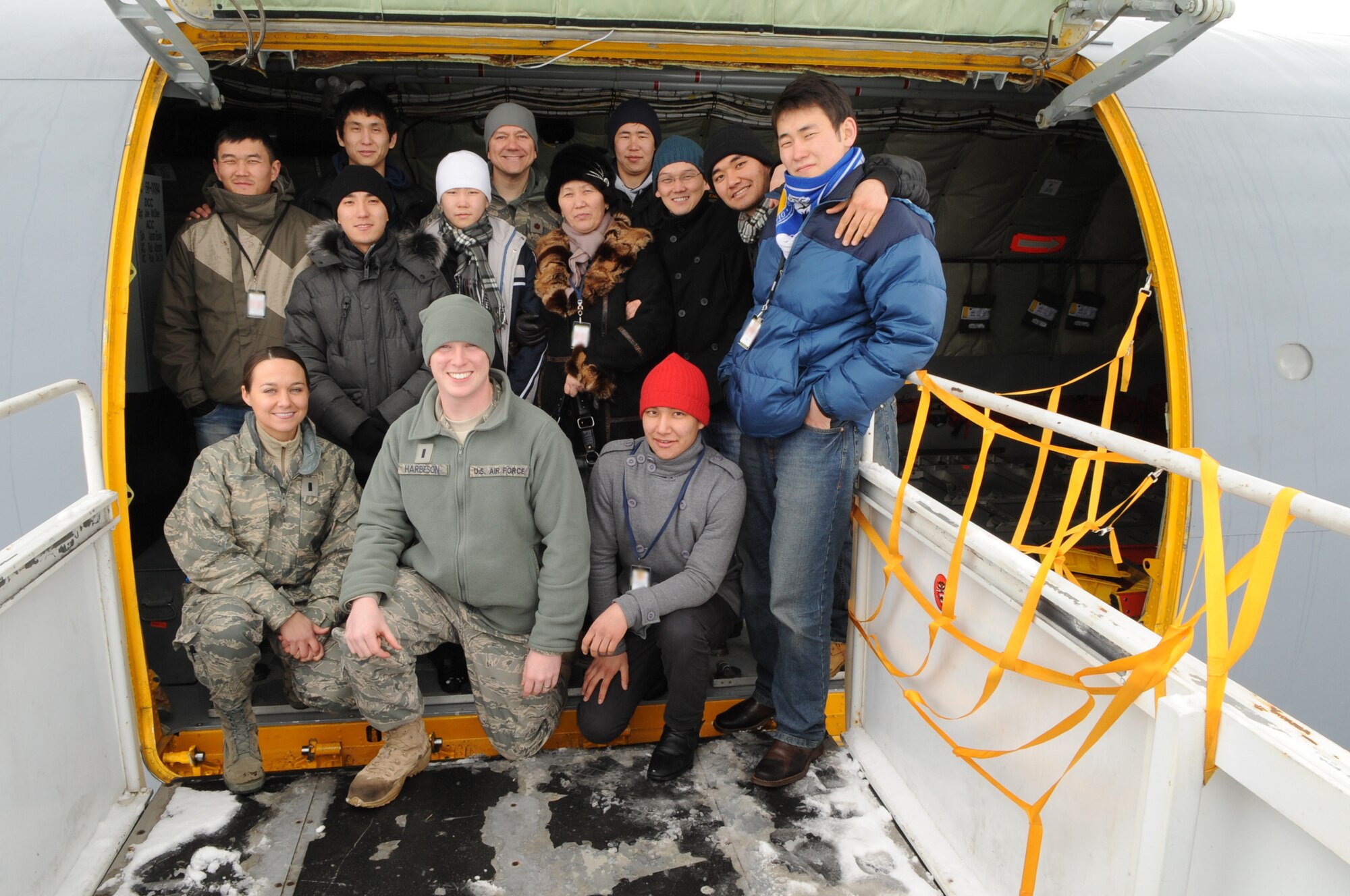 Members of the National Democratic Institute of Kyrgyzstan toured the Transit Center at Manas, Feb. 6, 2010, to get a better idea of the operations U.S. and coalition forces conduct here. They received a wing mission brief, toured a KC-135, saw a K9 demo, and spoke with Airmen from the Transit Center. (U.S. Air Force photo/Senior Airman Nichelle Anderson/released) 
