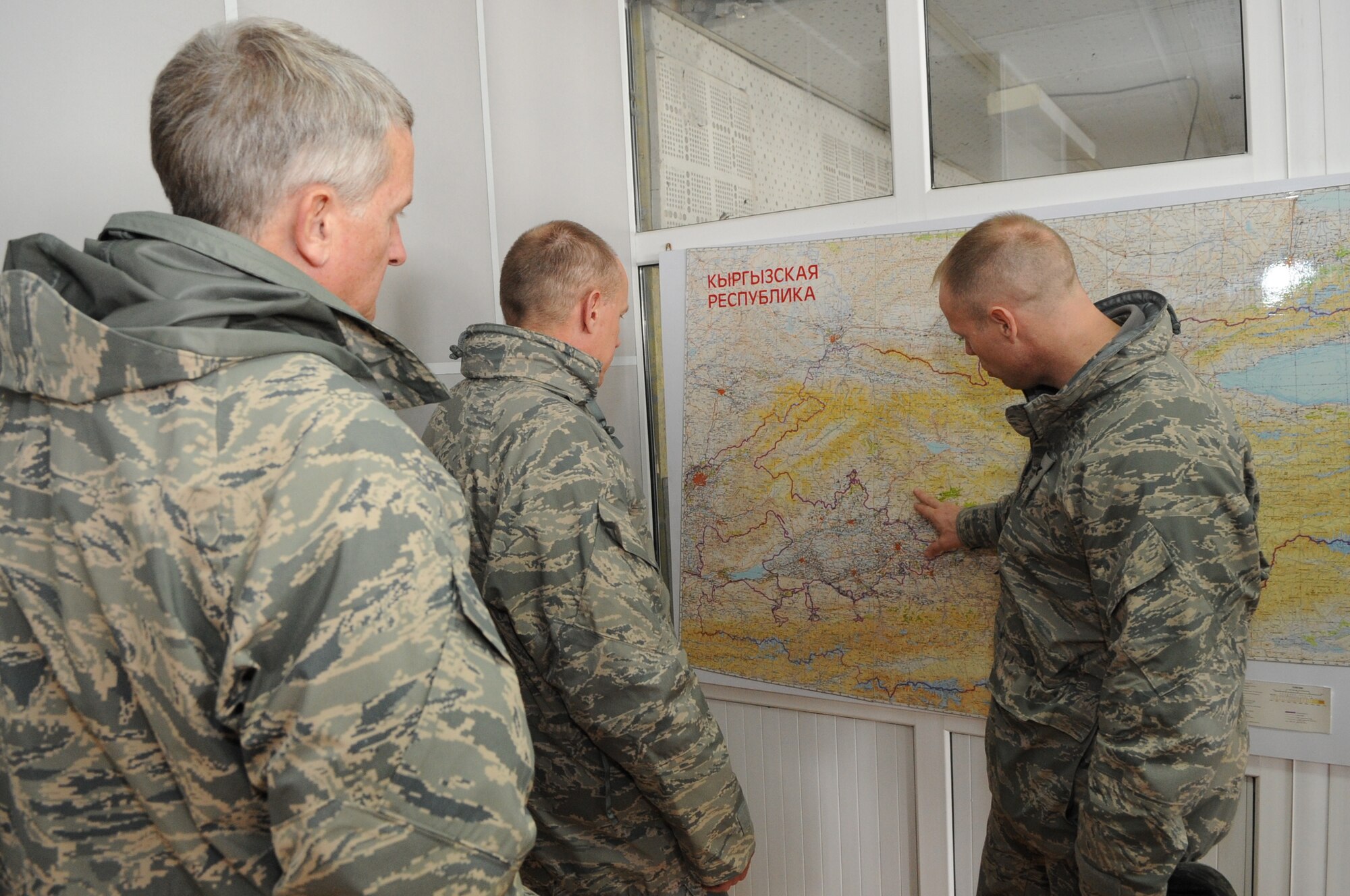 Col. Blaine Holt, 376th Air Expeditionary Wing commander, briefs Gen. Donald Hoffman, Commander of Air Force Materiel Command, on the geographical layout of Kyrgyzstan at the Transit Center at Manas, Kyrgyzstan, Feb. 7, 2010. General Hoffman visited the Transit Center as part of a trip through the U.S. Central Command?s area of responsibility to acquire feedback directly from the warfighter about the test and sustainment support AFMC is contributing to the fight. (U.S. Air Force photo/Senior Airman Nichelle Anderson/released)
