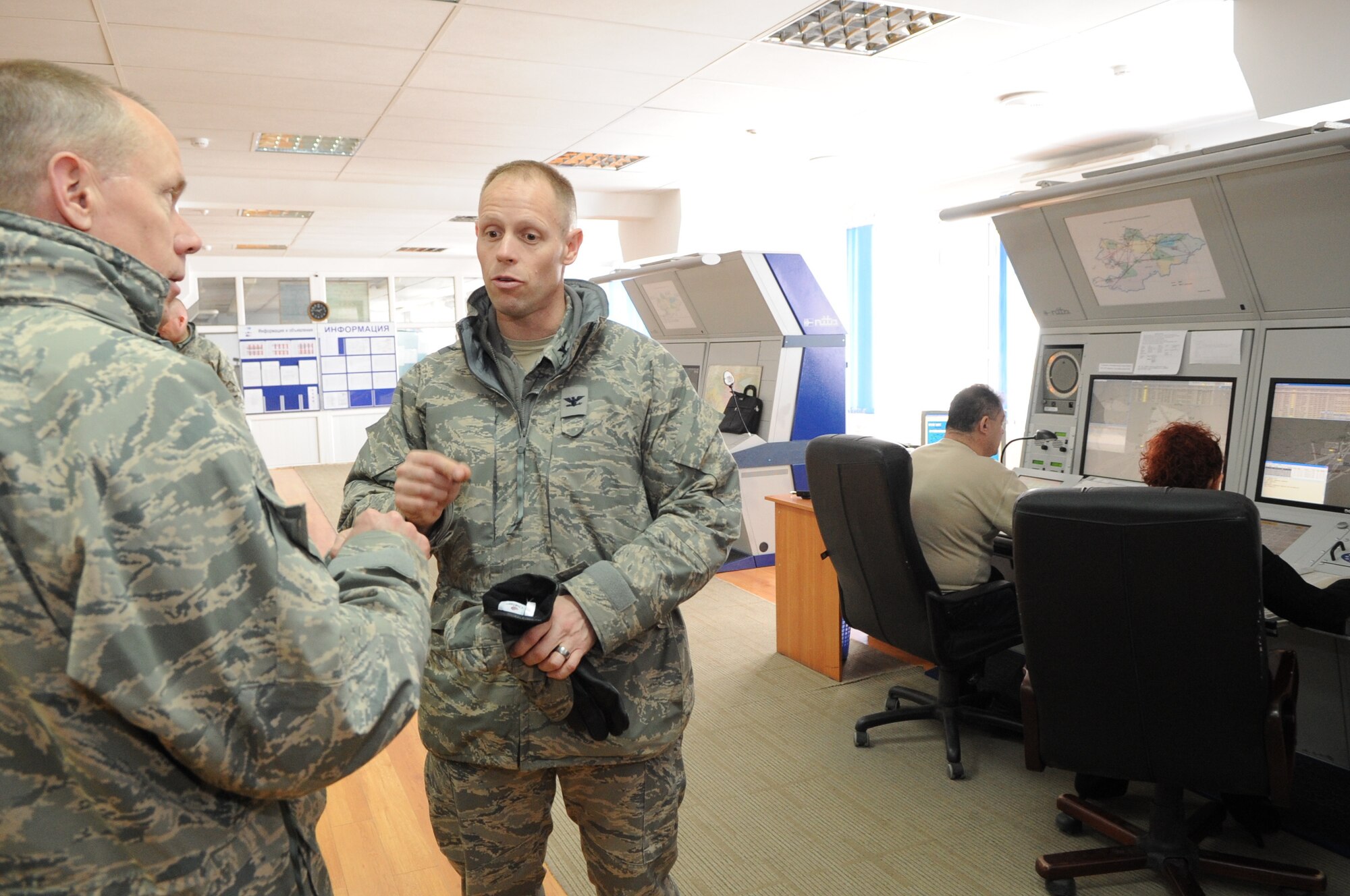 Col. Blaine Holt, 376th Air Expeditionary Wing commander, briefs Gen. Donald Hoffman, Commander of Air Force Materiel Command, on the joint air traffic control operations at the Transit Center at Manas, Kyrgyzstan, Feb. 7, 2010. General Hoffman visited the Transit Center as part of a trip through the U.S. Central Command?s area of responsibility to acquire feedback directly from the warfighter about the test and sustainment support AFMC is contributing to the fight. (U.S. Air Force photo/Senior Airman Nichelle Anderson/released)
