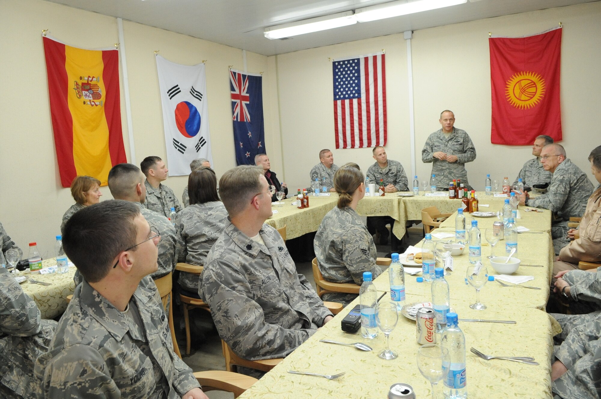 Gen. Donald Hoffman, Commander of Air Force Materiel Command, speaks to Airmen over dinner at the Transit Center at Manas, Kyrgyzstan, Feb. 6, 2010. General Hoffman visited the Transit Center as part of a trip through the U.S. Central Command?s area of responsibility to acquire feedback directly from the warfighter about the test and sustainment support AFMC is contributing to the fight.  (U.S. Air Force photo/Senior Airman Nichelle Anderson/released)