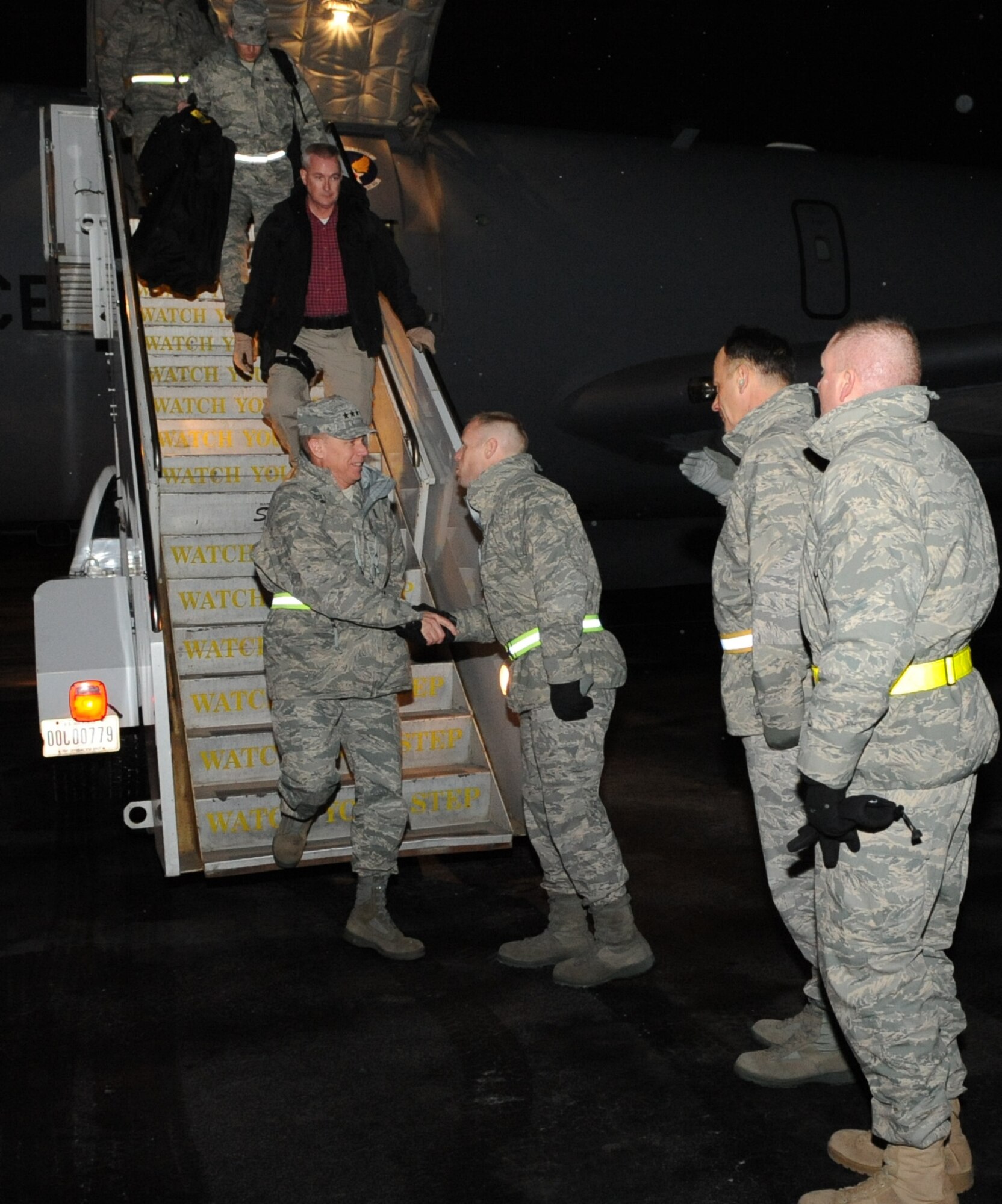 Col. Blaine Holt, 376th Air Expeditionary Wing commander, greets Gen. Donald Hoffman, Commander of Air Force Materiel Command, upon arriving at the Transit Center at Manas, Kyrgyzstan, Feb. 6, 2010. General Hoffman visited the Transit Center as part of a trip through the U.S. Central Command?s area of responsibility to acquire feedback directly from the warfighter about the test and sustainment support AFMC is contributing to the fight.  (U.S. Air Force photo/Senior Airman Nichelle Anderson/released)