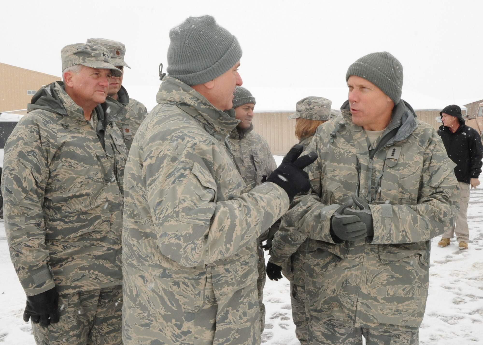 213  U.S. Air Force Senior Master Sgt. Henry Ellis, 376th Expeditionary Logistics Readiness Squadron fuels manager, briefs Gen. Donald Hoffman, Commander of Air Force Materiel Command, on the mission of the petroleum, oil and lubricant flight at the Transit Center at Manas, Kyrgyzstan, Feb. 7, 2010. General Hoffman visited the Transit Center as part of a trip through the U.S. Central Command’s area of responsibility to acquire feedback directly from the warfighter about the test and sustainment support AFMC is contributing to the fight. (U.S. Air Force photo/Staff Sgt. Carolyn Viss/released) 