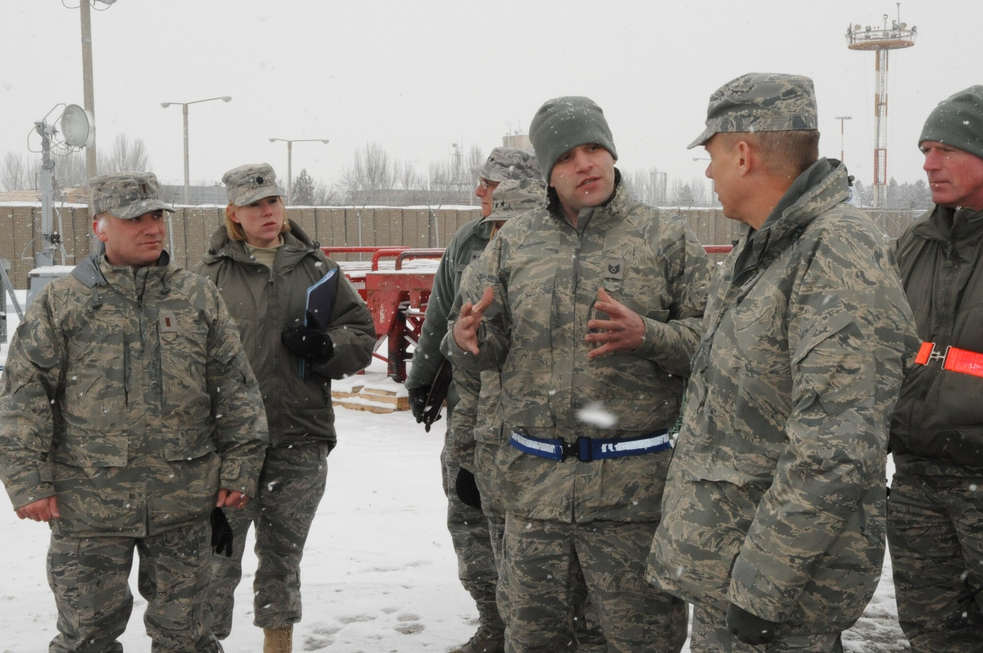 U.S. Air Force Tech. Sgt. Matthew Sollars, 376th Expeditionary Logistics Readiness Squadron aerial porter, briefs Gen. Donald Hoffman, Commander of Air Force Materiel Command, on the mission of the Transit Center at Manas , Kyrgyzstan, Feb. 7, 2010, in relation to the MRAP all-terrain vehicles that are being transported to Marines downrange. General Hoffman, visited the Transit Center as part of a trip through the U.S. Central Command’s area of responsibility to acquire feedback directly from the warfighter about the test and sustainment support AFMC is contributing to the fight. (U.S. Air Force photo/Staff Sgt. Carolyn Viss/released)