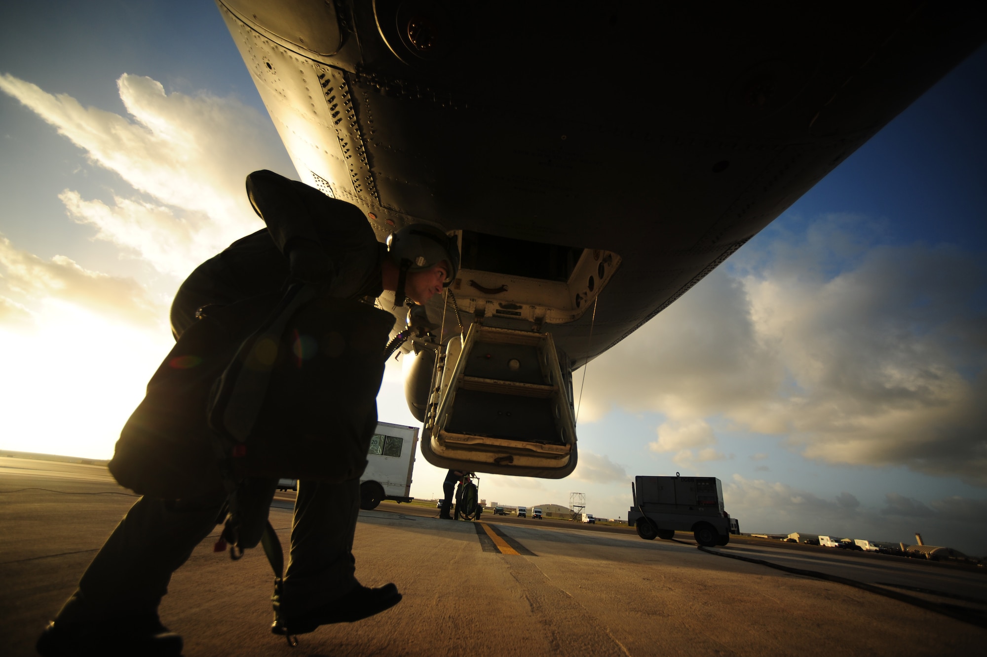 U.S. Air Force Capt. Kerry Baker, a B-52 Stratofortress navigator assigned to the 20th Expeditionary Bomb Squadron, Barksdale Air Force Base, La., prepares to step aboard a B-52 aircraft before a mission in support of Exercise Cope North at Andersen AFB, Guam, Feb. 9, 2010. The United States Air Force and the Japanese Air Self-Defense Force conduct Cope North annually to increase combat readiness and interoperability, concentrating on coordination and evaluation of air tactics, techniques and procedures.  The ability for both nations to work together increases their preparedness to support real-world contingencies.  (U.S. Air Force photo by Staff Sgt. Jacob N. Bailey)