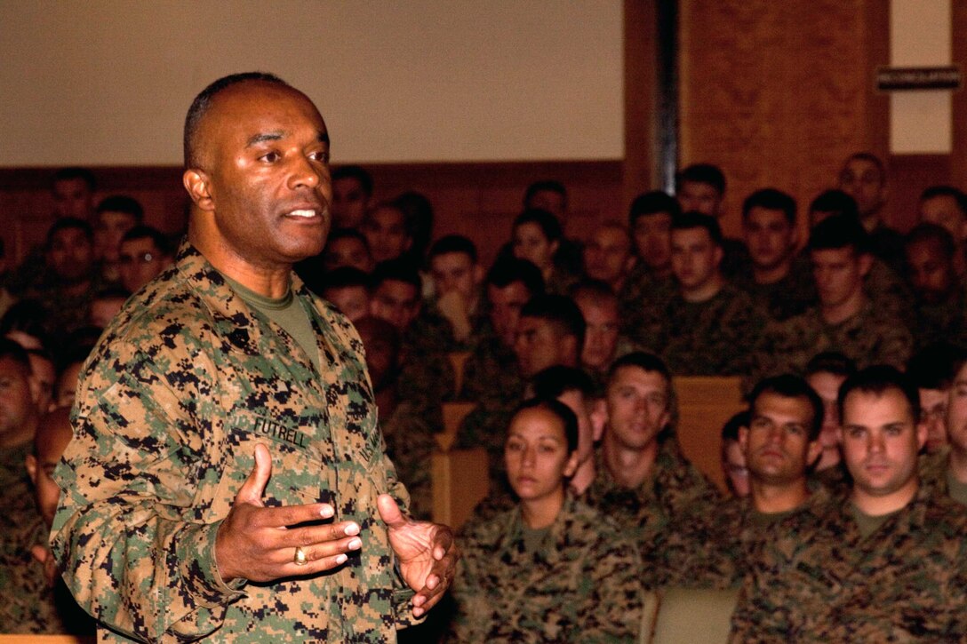 Sgt. Maj. James R. Futrell, U.S. Marine Corps Forces, Pacific, sergeant major, speaks to noncommissioned officers Feb. 11 at the Marine Corps Base Hawaii, Kaneohe Bay, Chapel. Futrell hosted the 2010 MarForPac Senior Enlisted Symposium to bring his top enlisted together, discuss current operations and address issues Marines face in combat, and at home. (U.S. Marine Corps Photo by Sgt. Juan D. Alfonso) (Released)