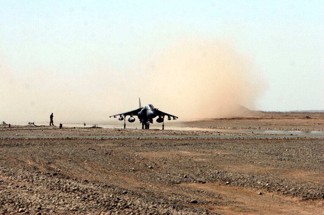 An AV-8/B Harrier from Marine Attack Squadron 231, Marine Aircraft Group 40, Marine Expeditionary Brigade-Afghanistan, lands at the flightline here, Feb. 10.  The squadron tested the capability to land, refuel and rearm at Camp Dwyer, which will increase the unit's options for future operations.