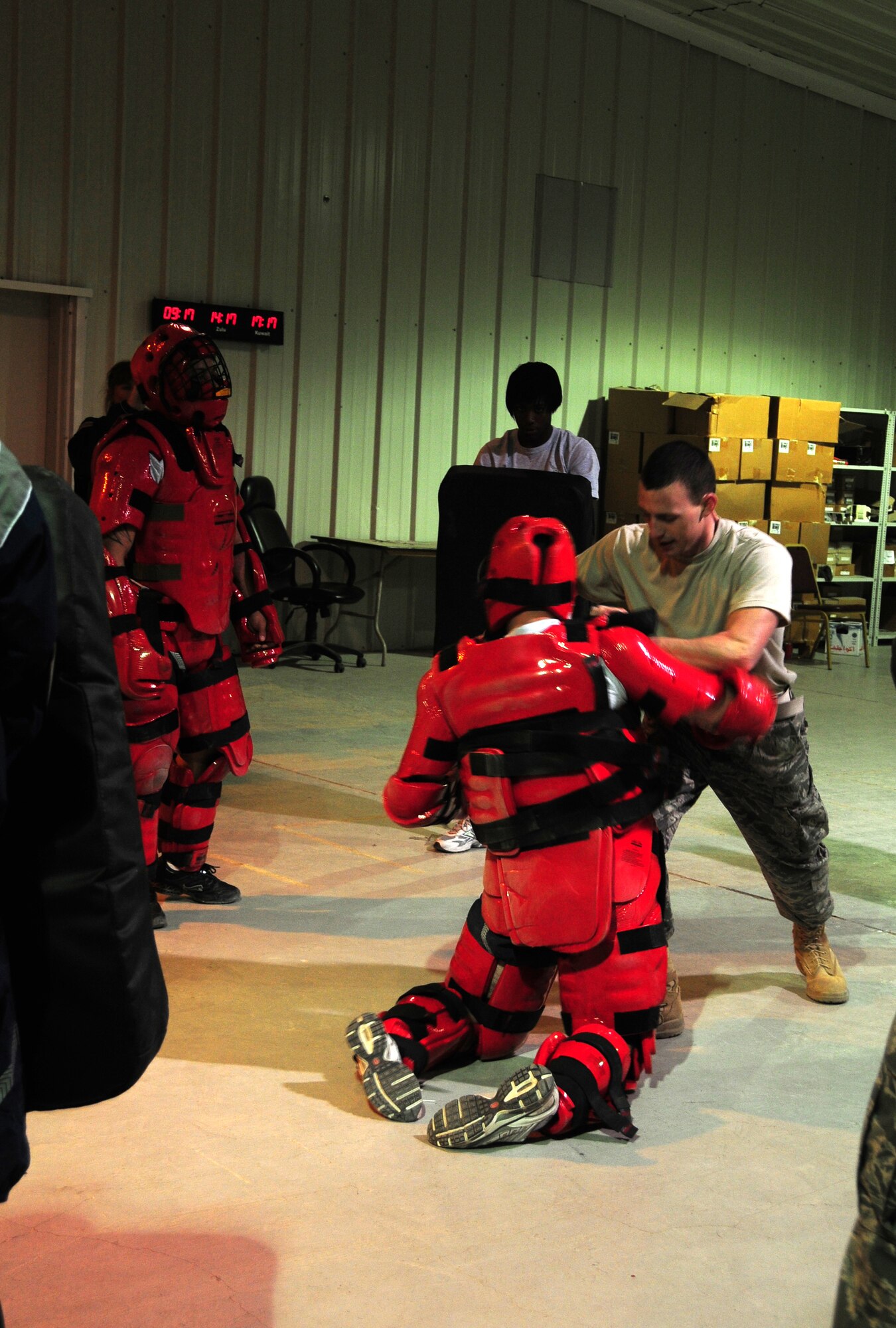 U.S. Air Force Airman 1st Class Timothy A. Pittman, a C-130 aircraft hydraulics technician deployed from Davis Monthan Air Force Base, Ariz., fends off a practice assailant during a 386th Expeditionary Security Forces Squadron Force Protection flight asp training session Feb. 9, 2010 at an air base in Southwest Asia. The 386th ESFS conducts the class to prepare inbound force protection Airmen to handle any hostile situation that may arise during their time downrange.   (U.S. Air Force photo by Staff Sgt. Lakisha A. Croley/Released)