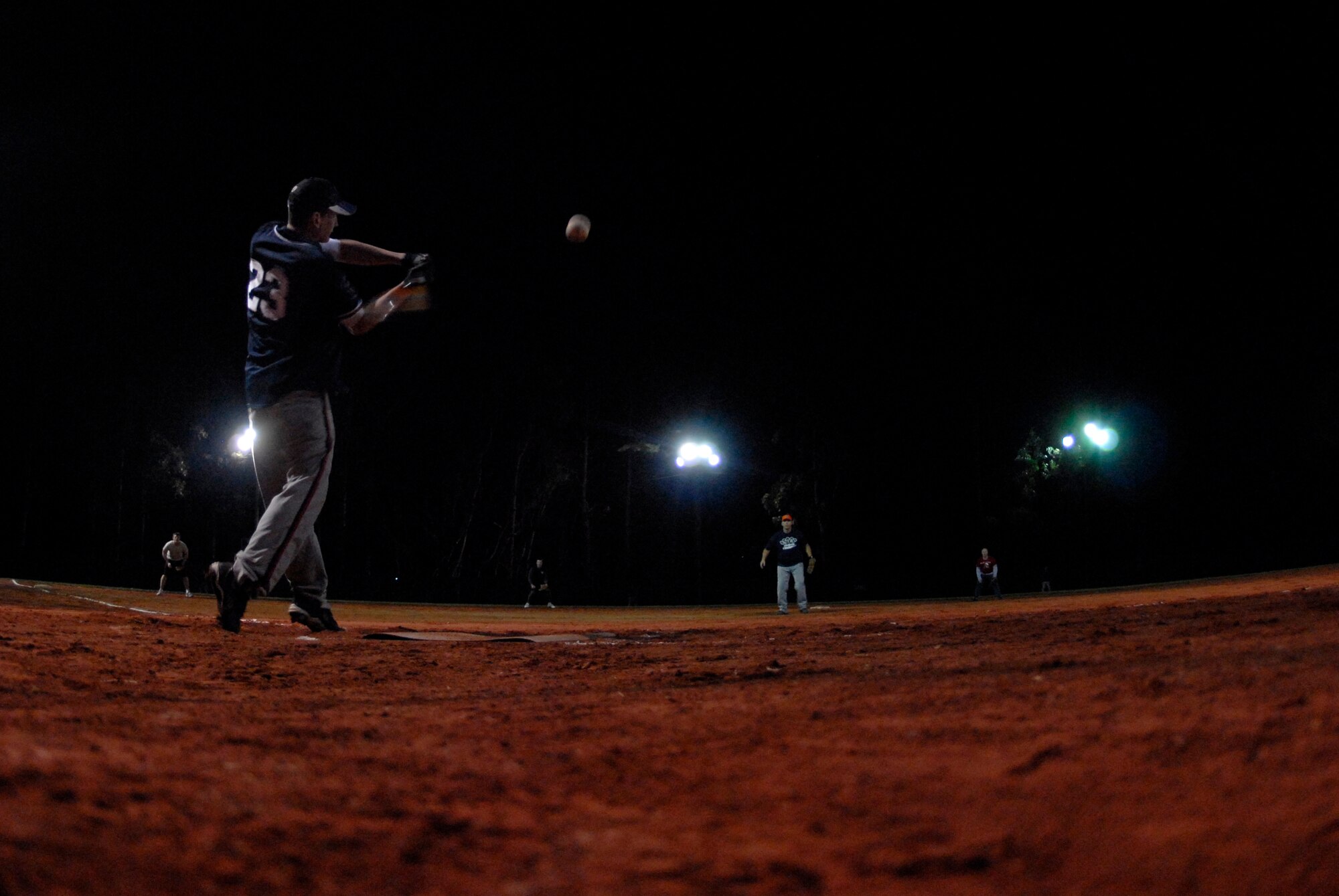 VANDENBERG AIR FORCE BASE, Calif. - Homerun-hitter Kyle Hostetler, of the 576th Flight Test Squadron’s intramural softball team, scores another run for his team during a match-up against the 30th Space Communications Squadron at the base softball field here Thursday, Feb. 4, 2010.  The 576th FLTS shut-out the 30th SCS 19-0. (U.S. Air Force photo/Senior Airman Andrew Satran) 
