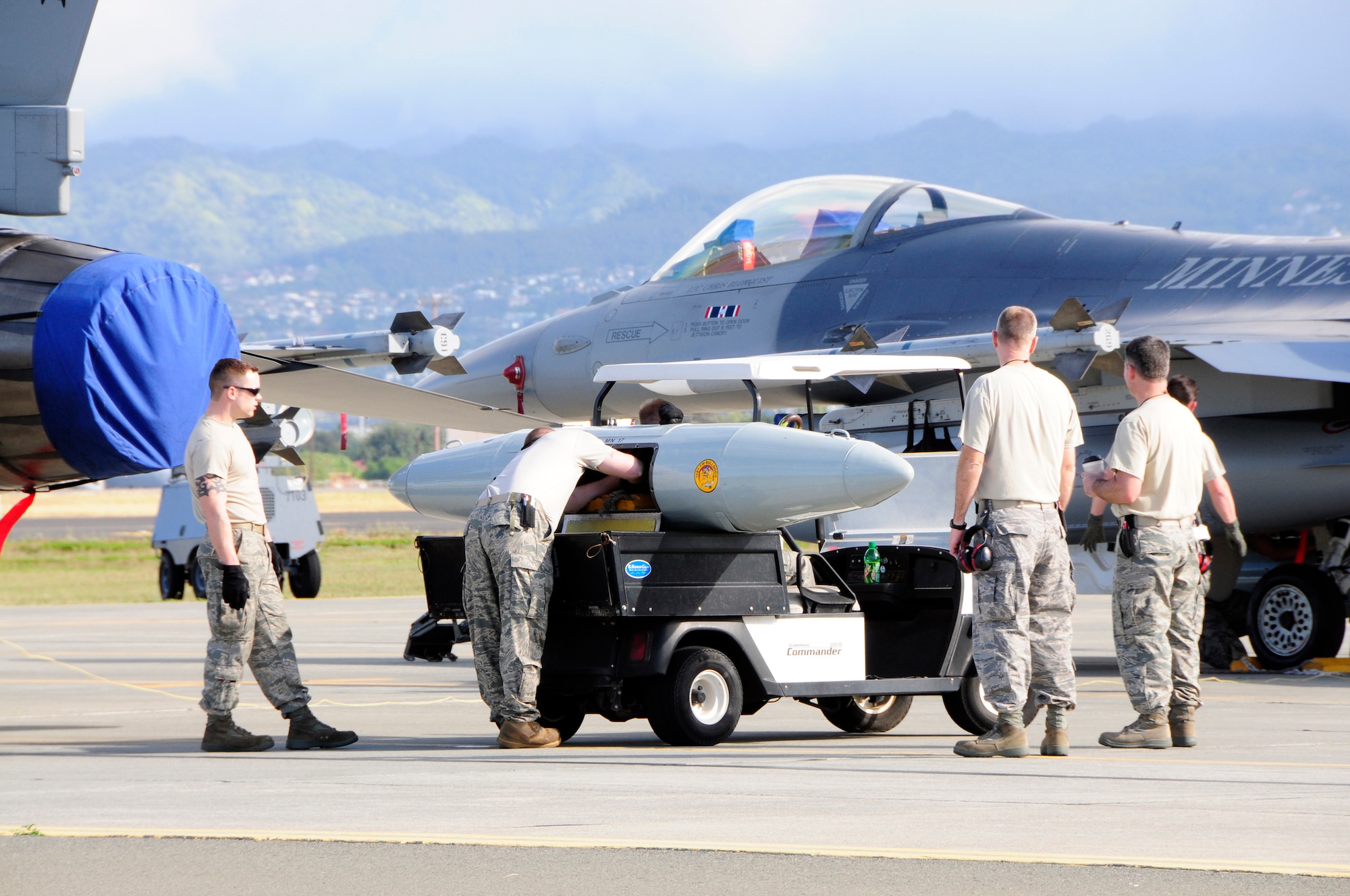 F-16s from the 148th Fighter Wing in Duluth, Minnesota are unloaded by 148th maintenance members after arriving at Hickam Air Force Base in Hawaii on January 31, 2010.  The 148th FW is at Hickam AFB to take part in Sentry Aloha.  (U.S. Air Force photo by Ssgt. Donald L. Acton)
