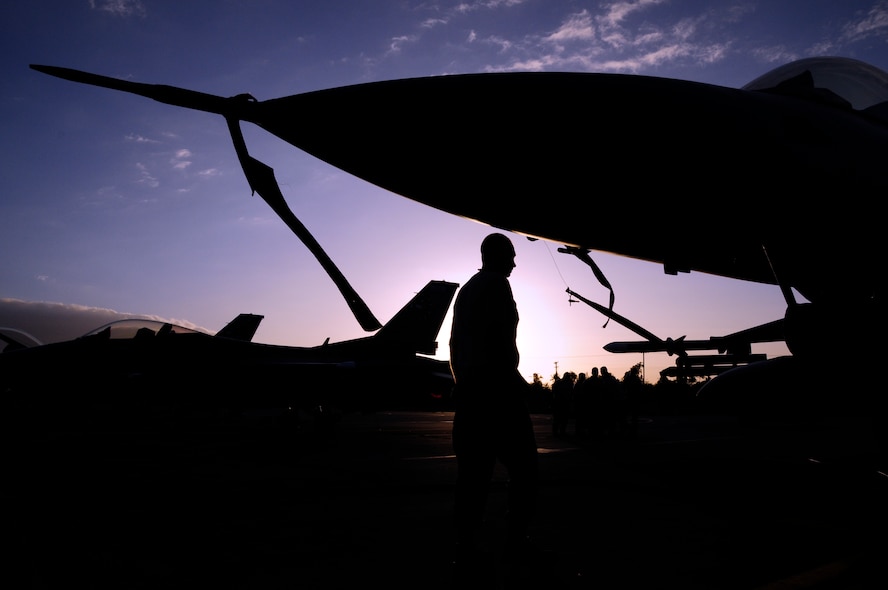 Members of the 148th Fighter Wing from Duluth Minnesota prepare for a day of flying while at Hickam Air Force Base in Oahu on February 3, 2010.  The 148th FW is partaking in Sentry Aloha while at Hickam AFB.  (U.S. Air Force photo by Ssgt Donald L. Acton)