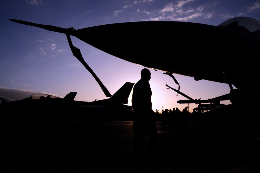 Members of the 148th Fighter Wing from Duluth Minnesota prepare for a day of flying while at Hickam Air Force Base in Oahu on February 3, 2010.  The 148th FW is partaking in Sentry Aloha while at Hickam AFB.  (U.S. Air Force photo by Ssgt Donald L. Acton)