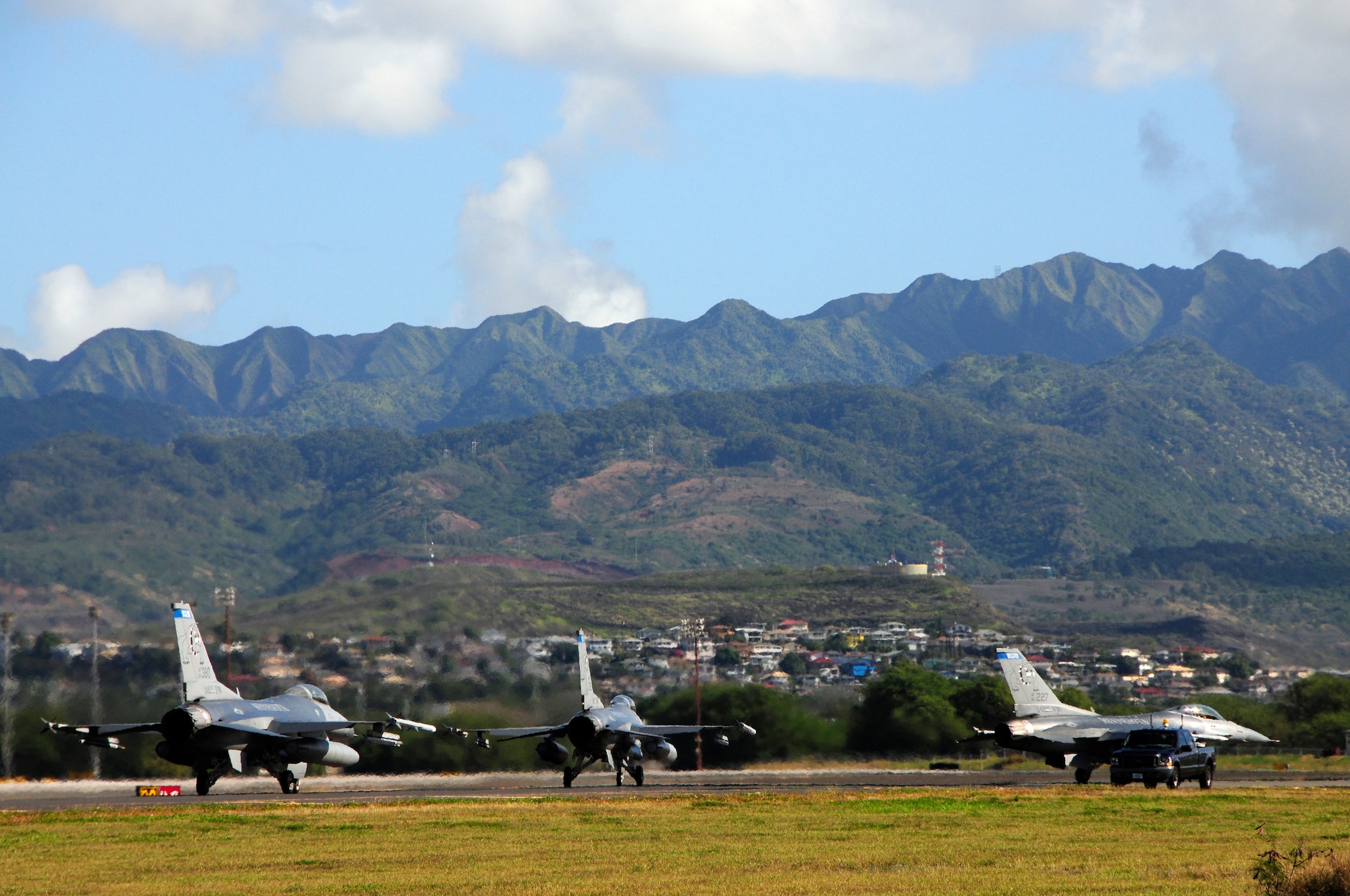 Two F-16s from the 148th Fighter Wing, out of Duluth Minnesota taxi down the runway at Hickam Air Force Base in Hawaii on February 1, 2010.  The 148th FW is at Hickam AFB to partake in Sentry Aloha.  (U.S. Air Force photo by Ssgt Donald L. Acton)