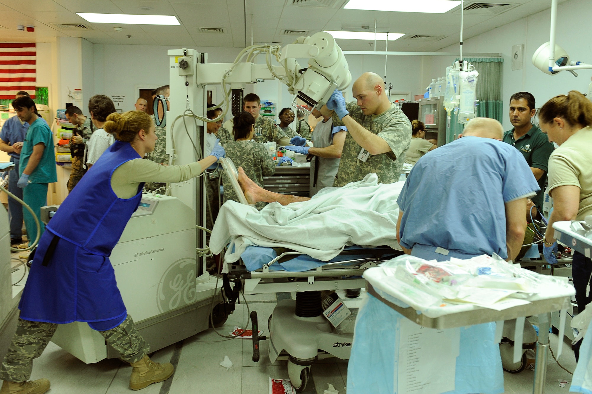 Airmen from the 455th Expeditionary Medical Group work in the emergency room to save avalanche victims who were medically evacuated Feb. 9, 2010, to Craig Joint Theater Hospital at Bagram Airfield, Afghanistan. Dozens of Afghans were taken to Bagram Airfield after avalanches struck a mountain pass in the Parwan Province. (U.S. Air Force photo by/Tech. Sgt. Jeromy K. Cross)