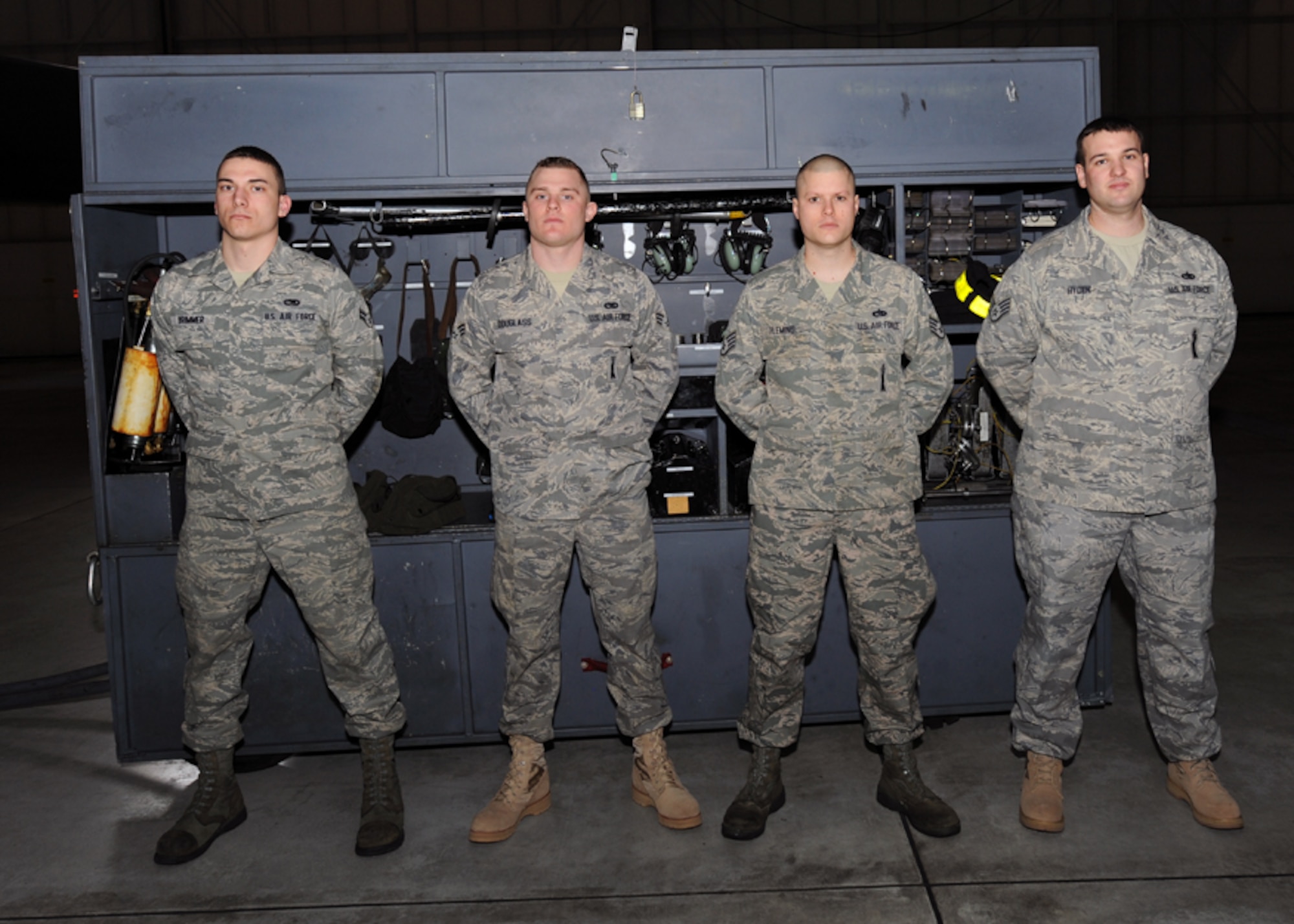 MINOT AIR FORCE BASE, N.D. – Crew 26 won the load crew of the quarter competition here Feb. 5. The members of the Crew 26 weapons loading team were: Airman 1st Class Matthew Brimmer, Senior Airman Dennis Douglass, Staff Sgt. Joseph Fleming and Staff Sgt. Dustin Hayden. (U.S. Air Force photo by Senior Airman Sharida Jackson)